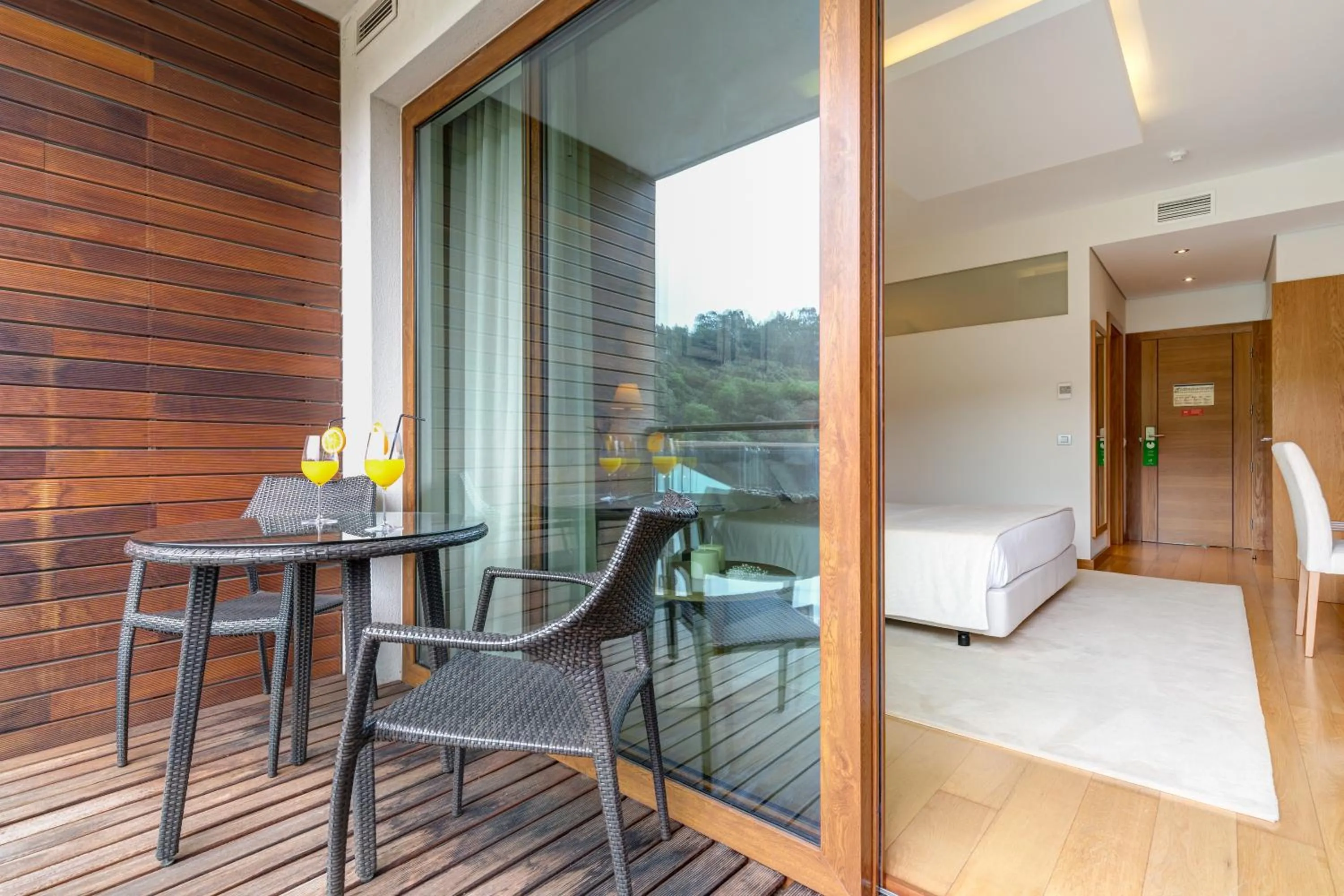 Balcony/Terrace, Bed in Hotel Rural Vale Do Rio