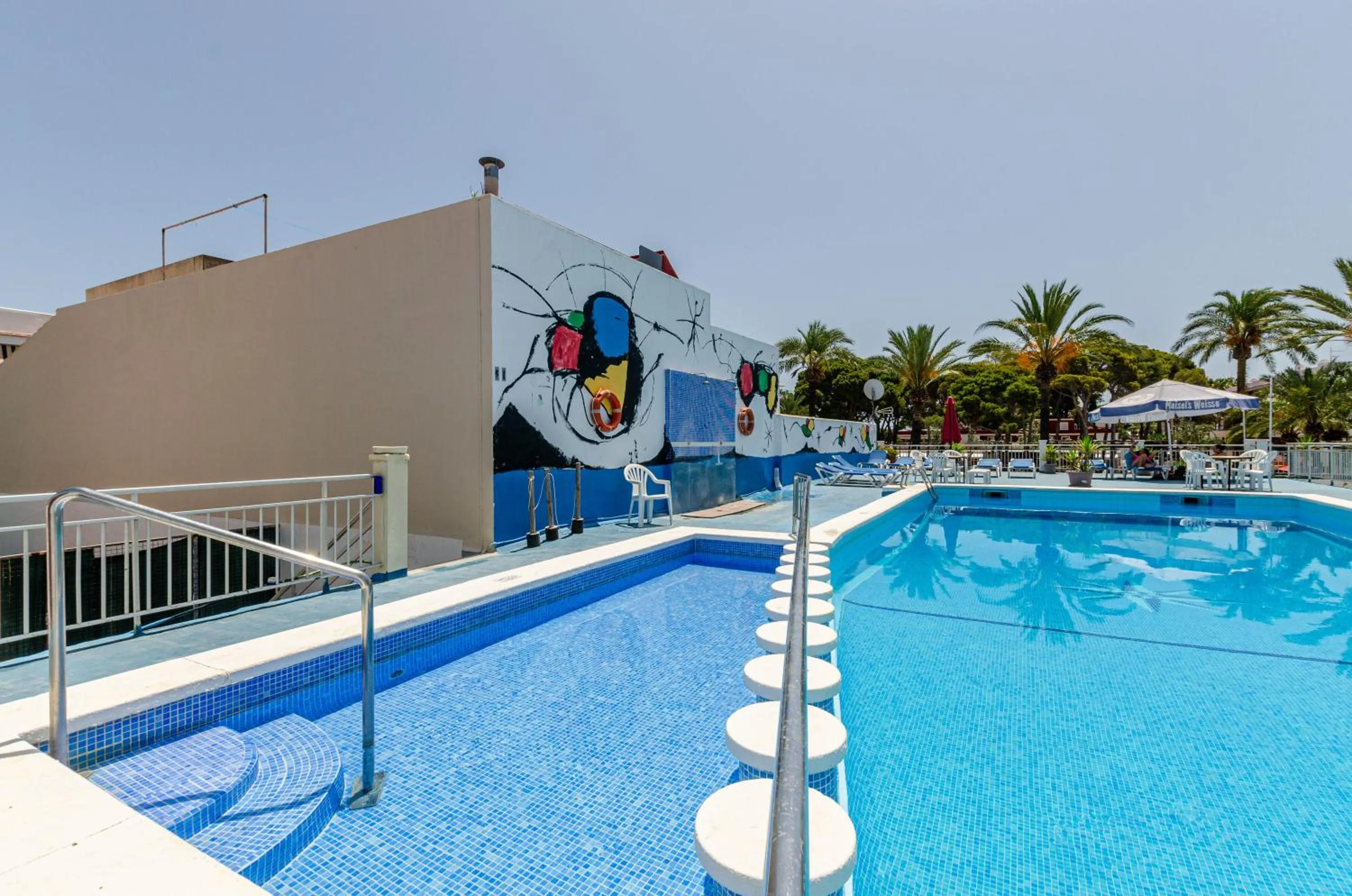 Swimming pool in Hostal Gami Adults Only