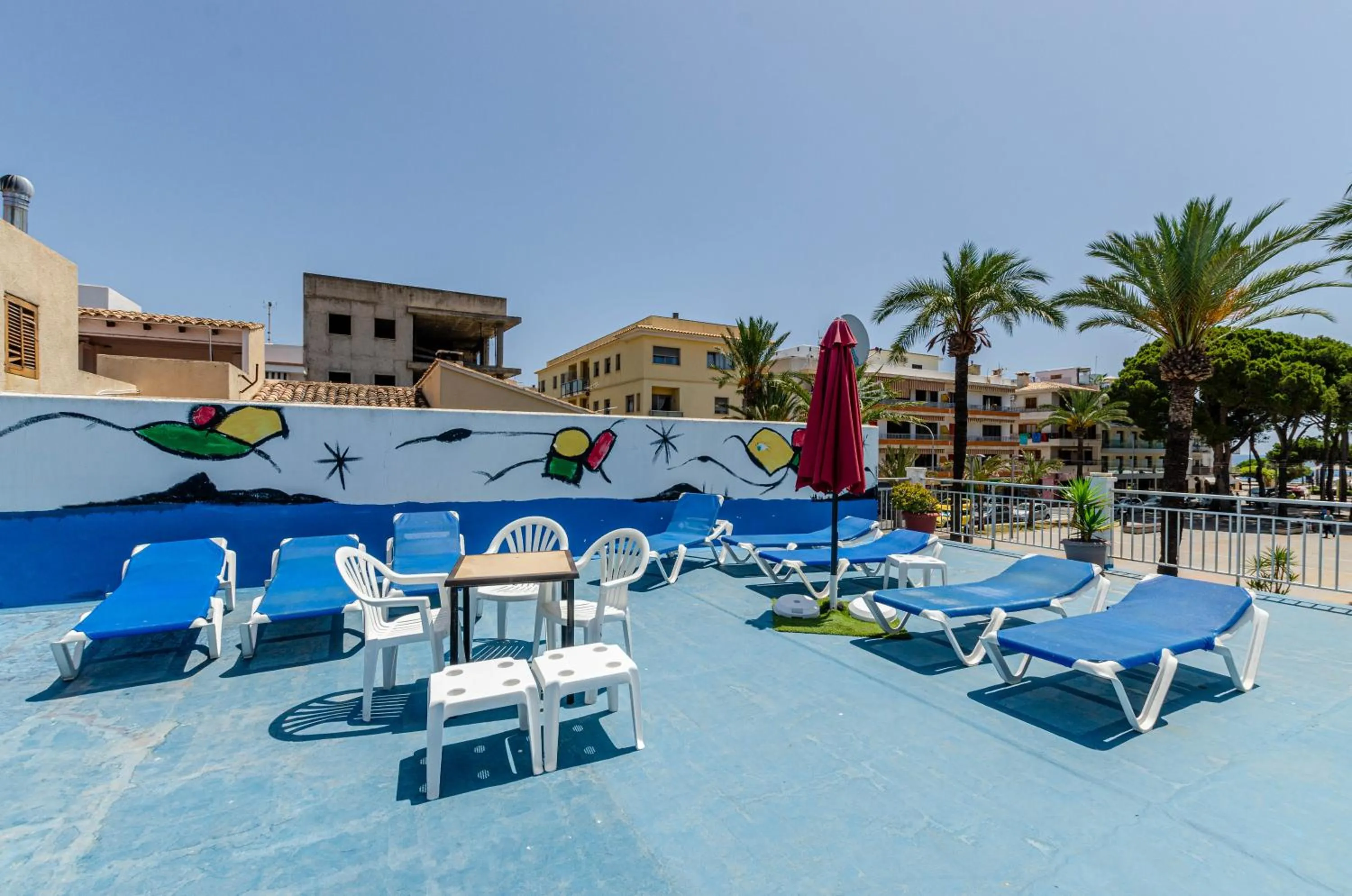 Swimming pool in Hostal Gami Adults Only