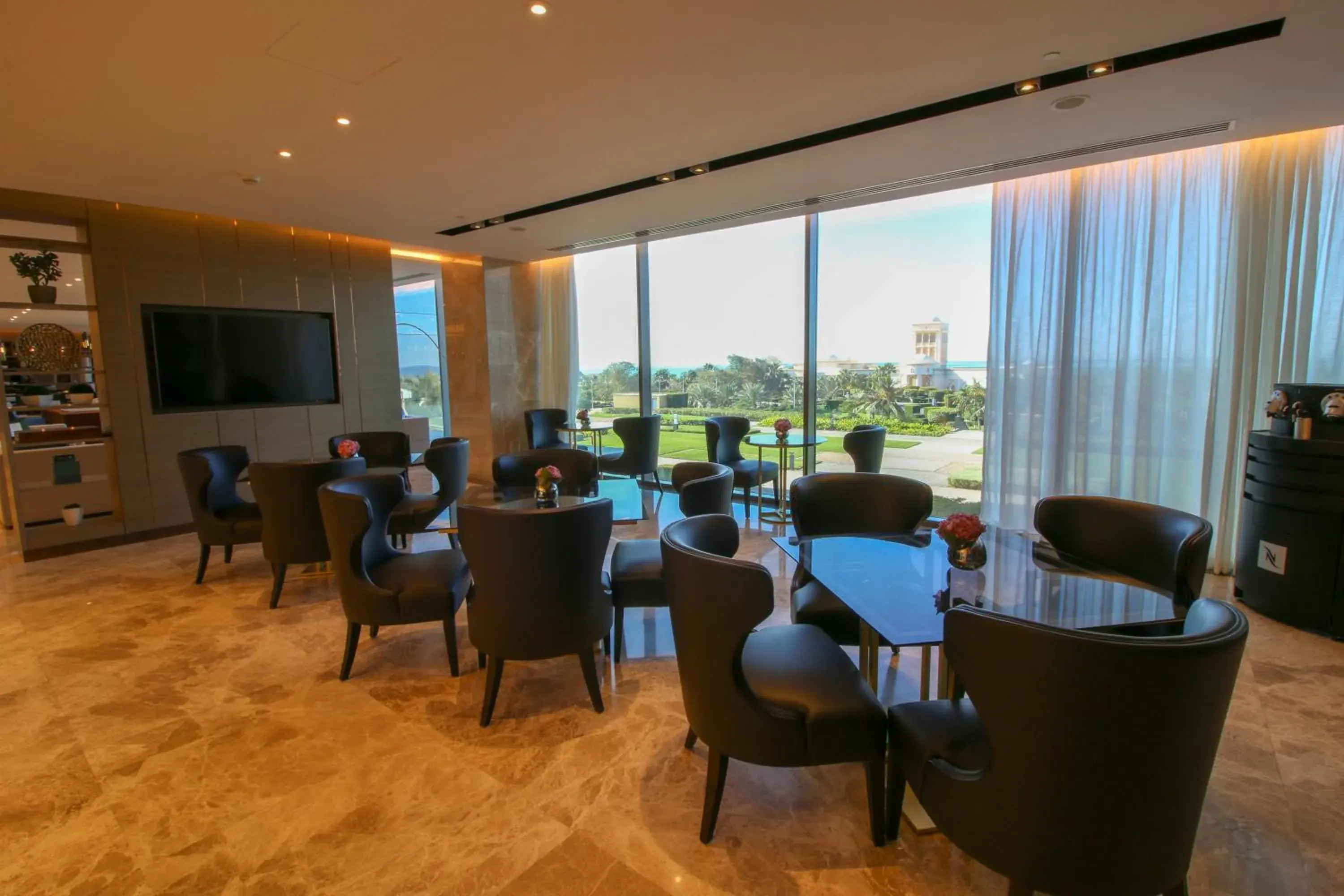 Lounge or bar in Views Hotel & Residences - Emaar King Abdullah Economic City Lounge or bar in Views Hotel & Residences - Emaar King Abdullah Economic City
