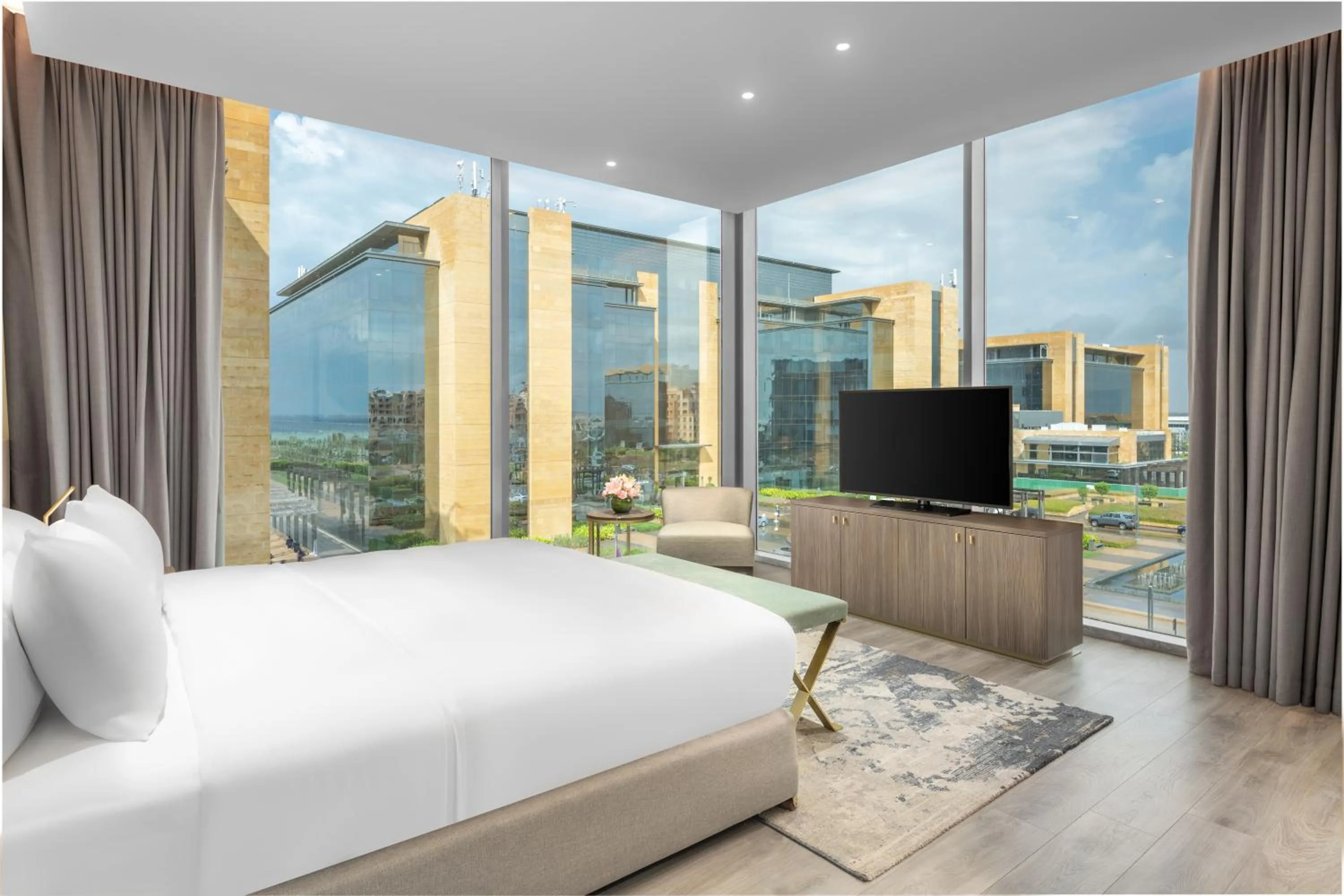 Living room, Bed in Views Hotel & Residences - Emaar King Abdullah Economic City