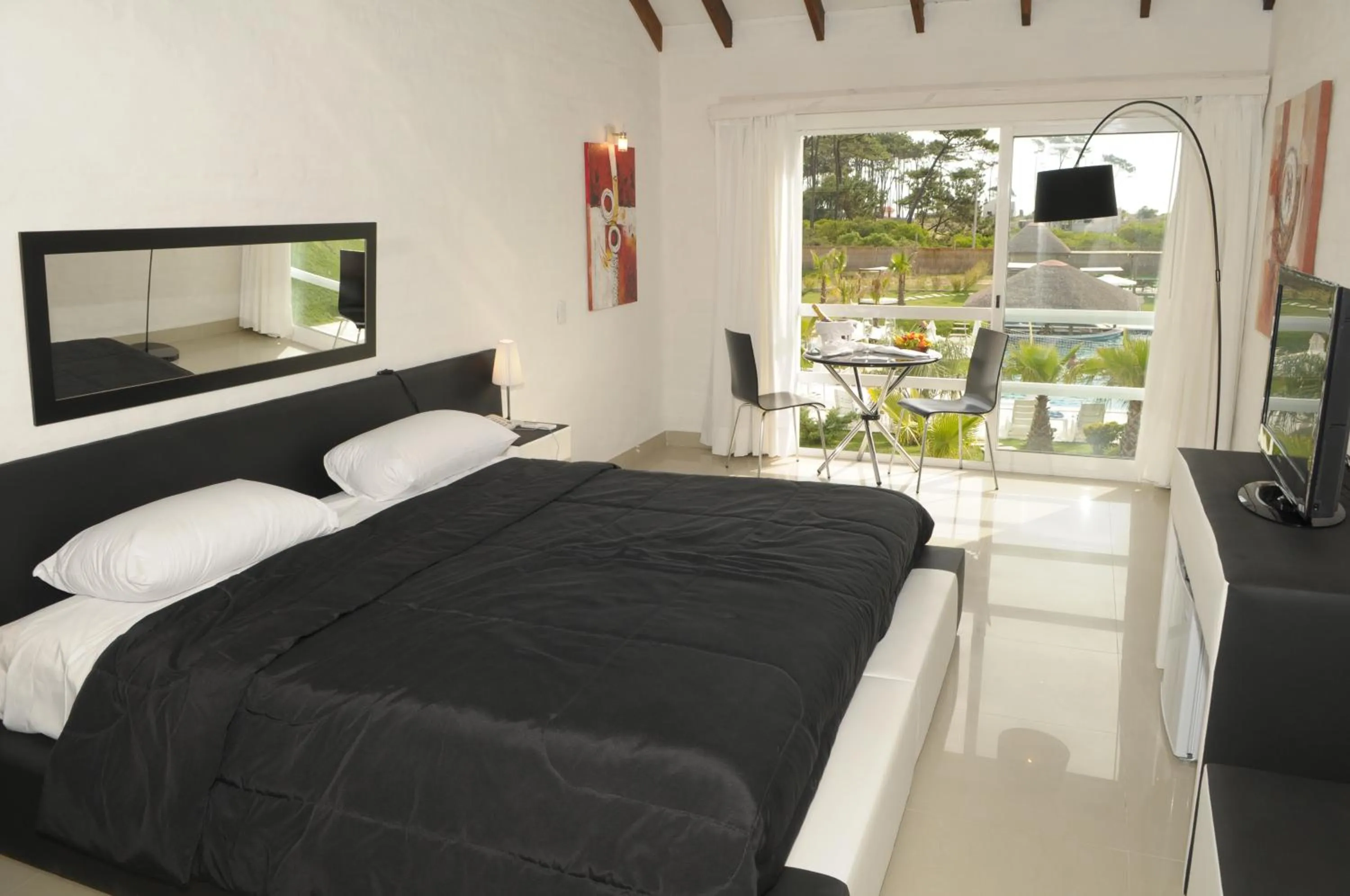 Bedroom, Bed in Punta del Este Arenas Hotel