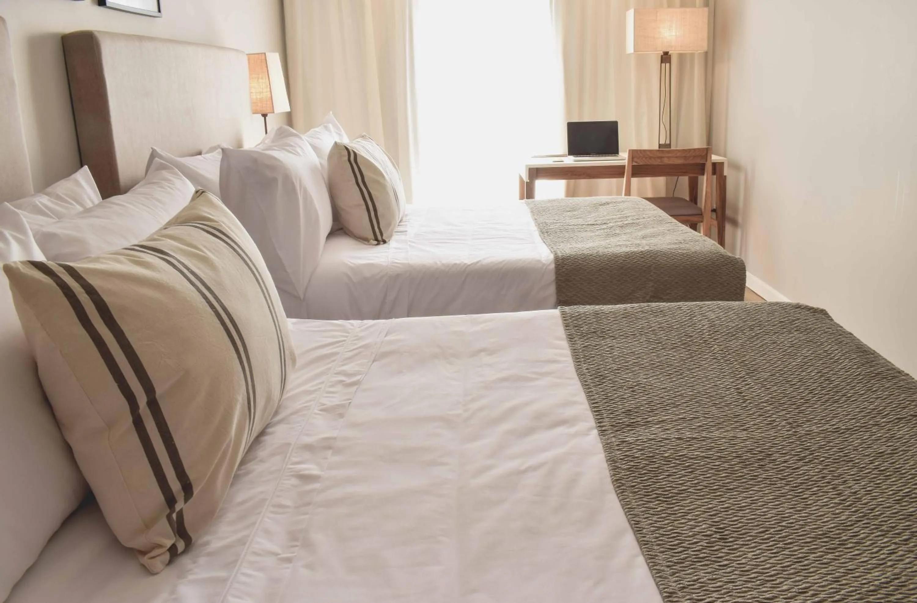 Photo of the whole room, Bed in Cyan Soho Neuquén Hotel