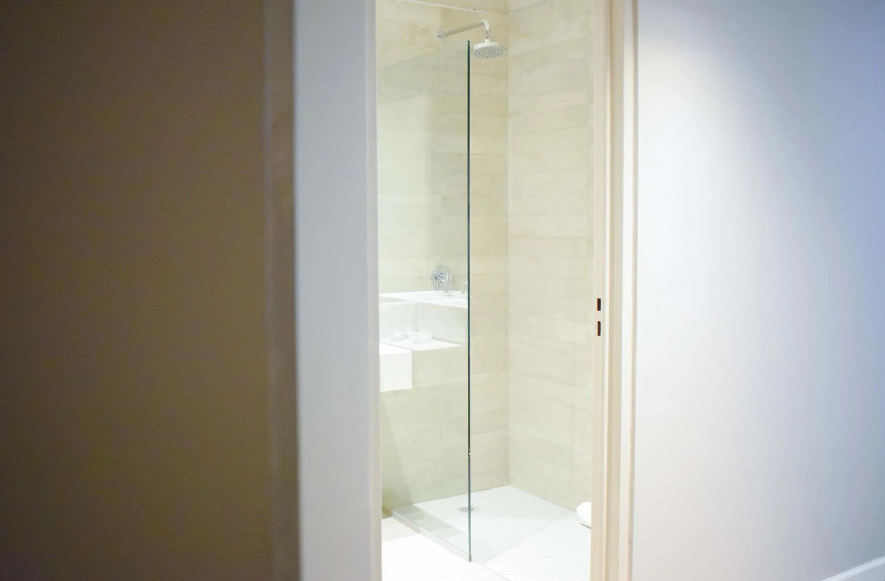 Shower in Cyan Soho Neuquén Hotel