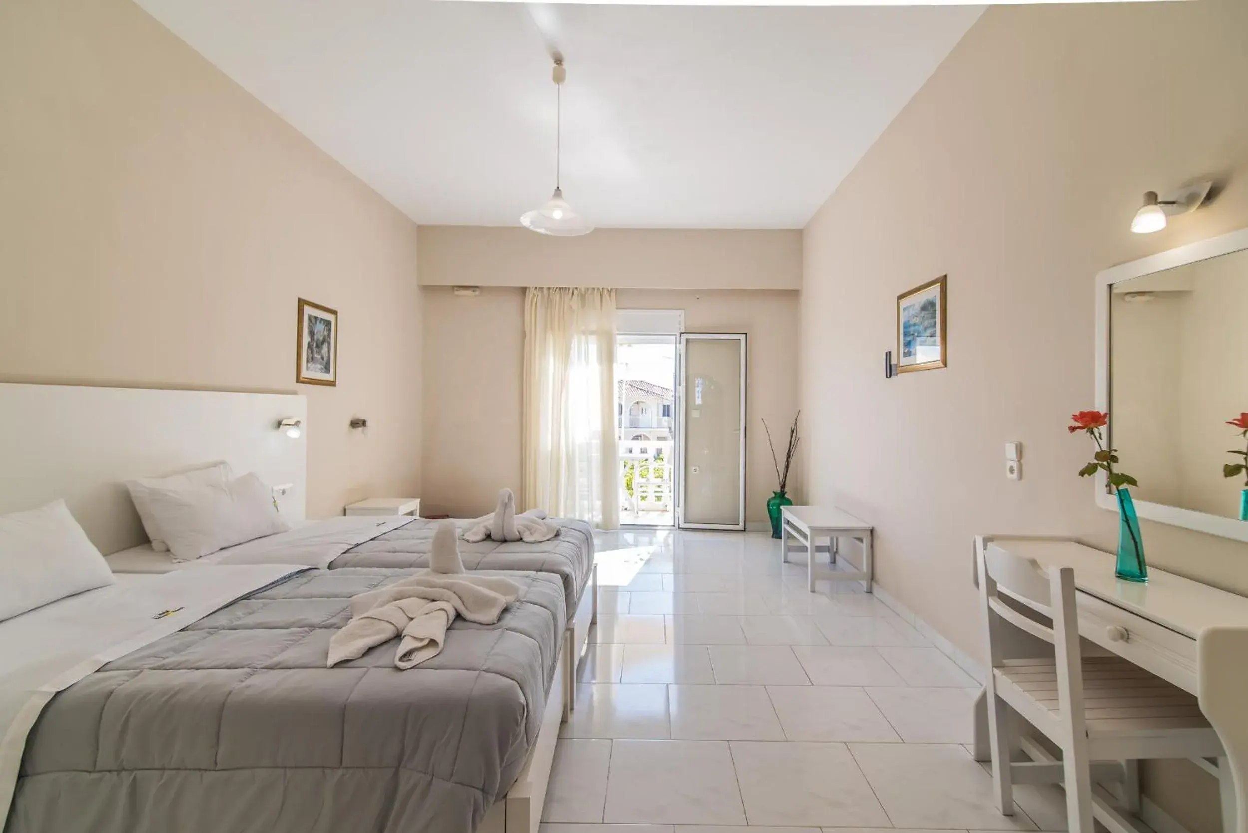 Bedroom in Belussi Beach Hotel & Suites Bedroom in Belussi Beach Hotel & Suites