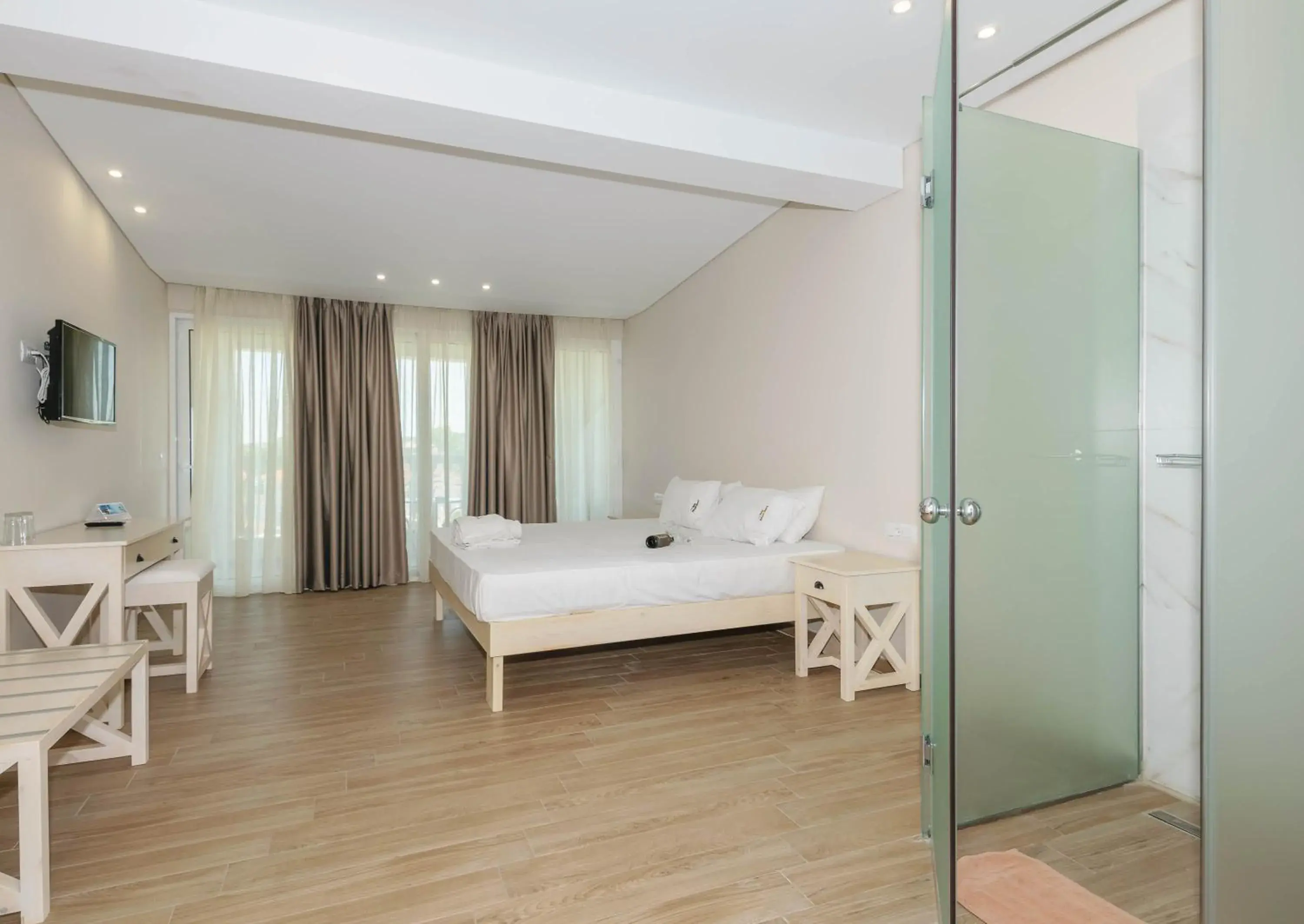 Photo of the whole room in Belussi Beach Hotel & Suites Photo of the whole room in Belussi Beach Hotel & Suites