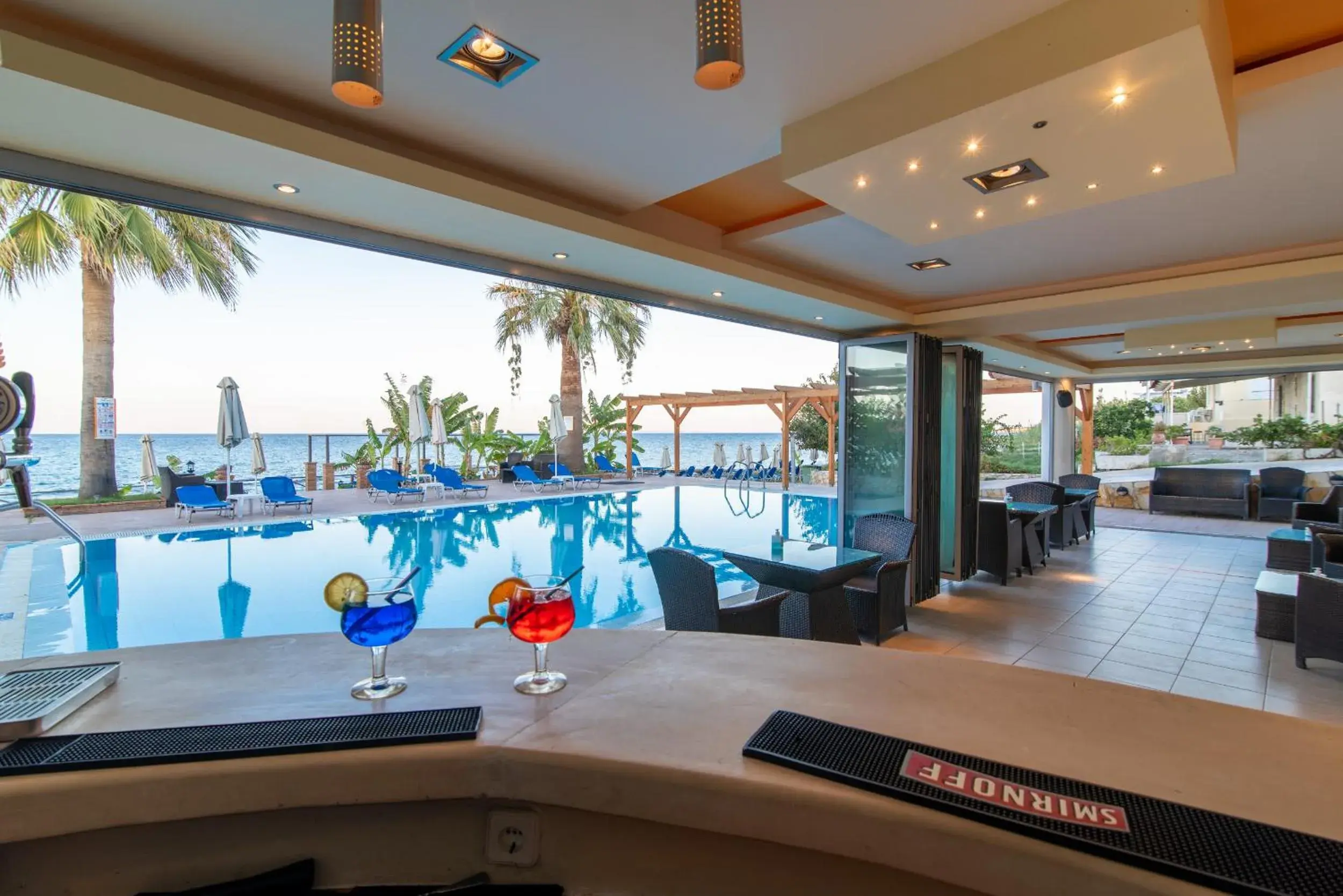 Lounge or bar in Belussi Beach Hotel & Suites Lounge or bar in Belussi Beach Hotel & Suites