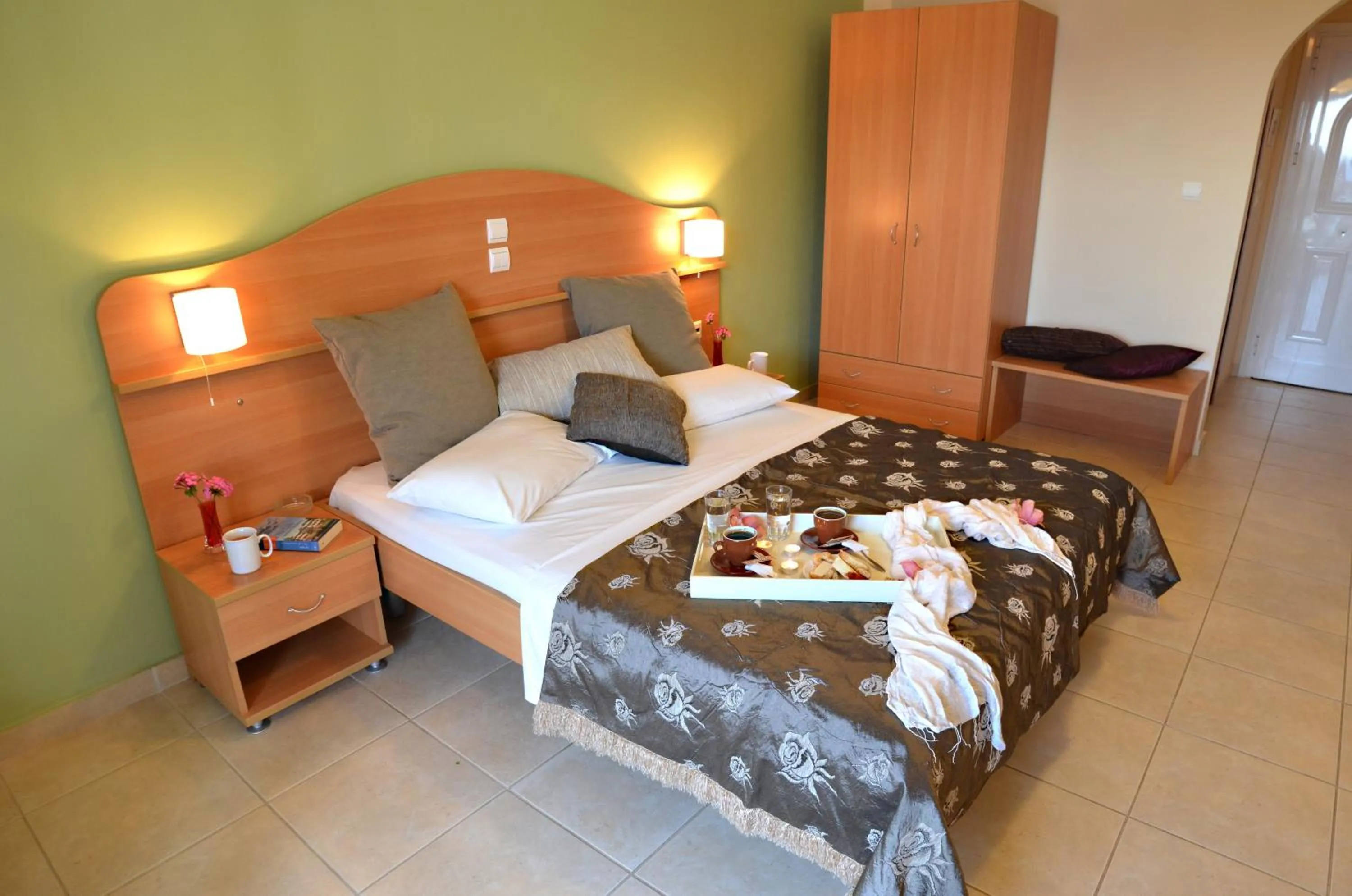 Bed in Belussi Beach Hotel & Suites