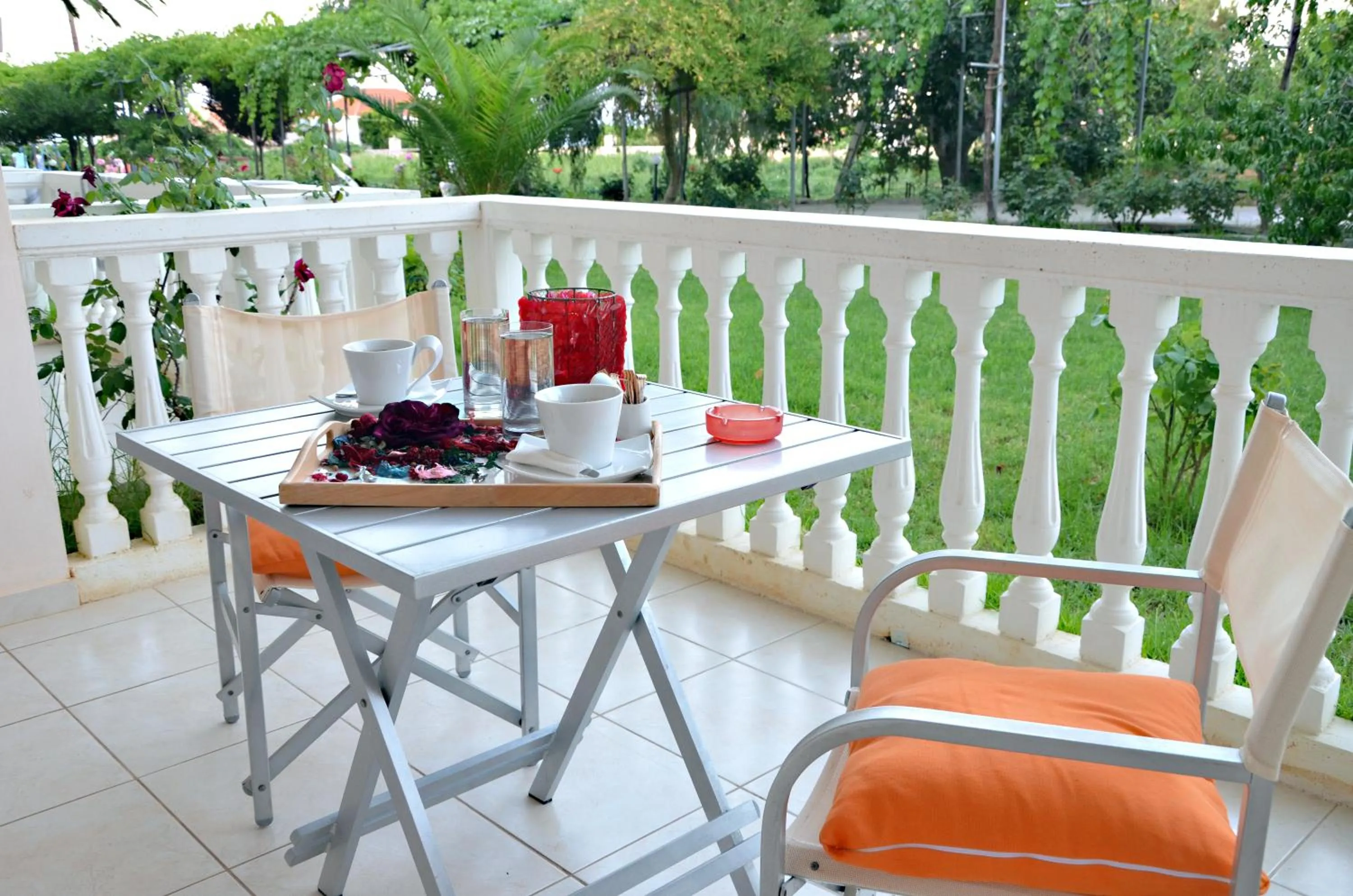 Patio in Belussi Beach Hotel & Suites