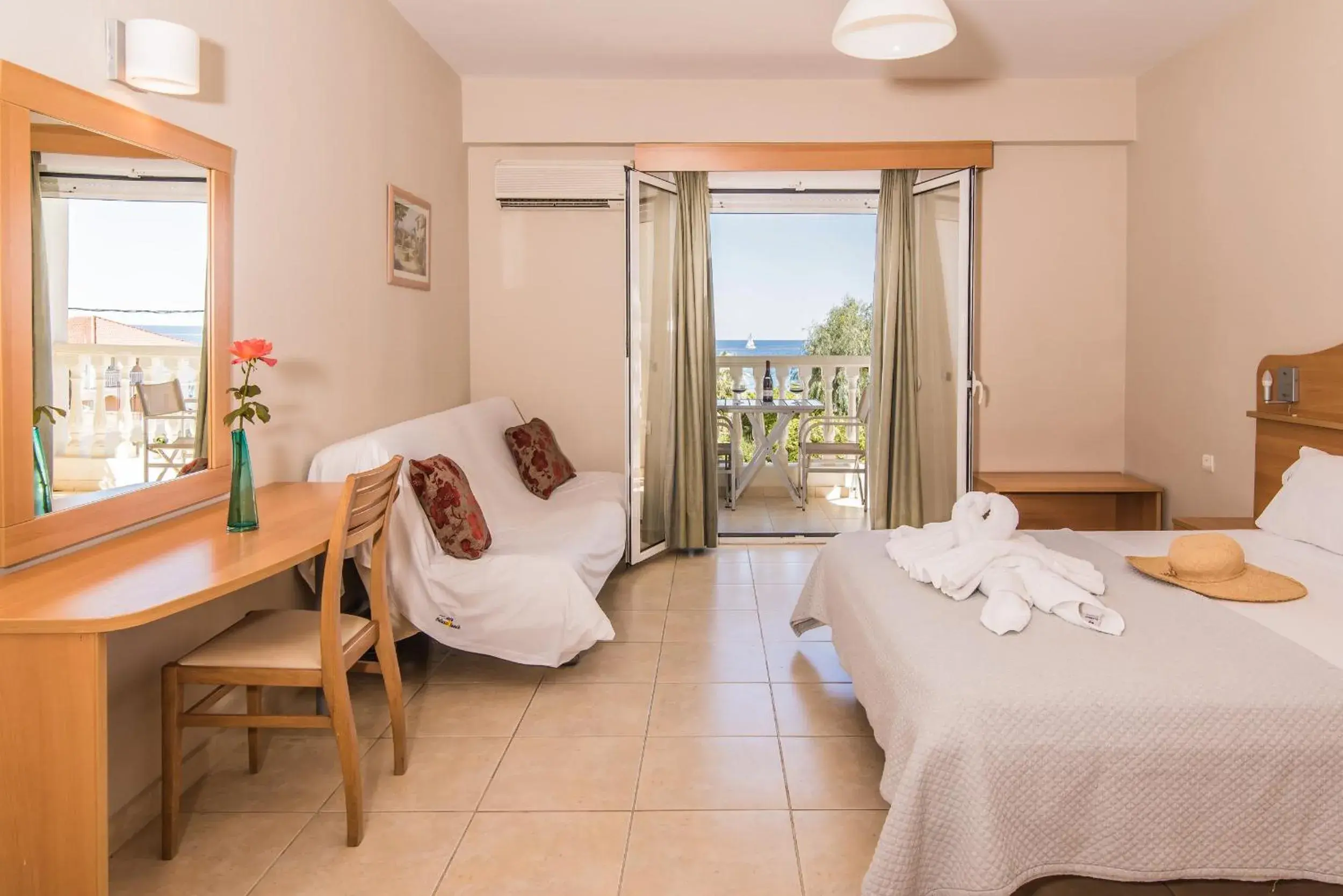 Bedroom in Belussi Beach Hotel & Suites Bedroom in Belussi Beach Hotel & Suites