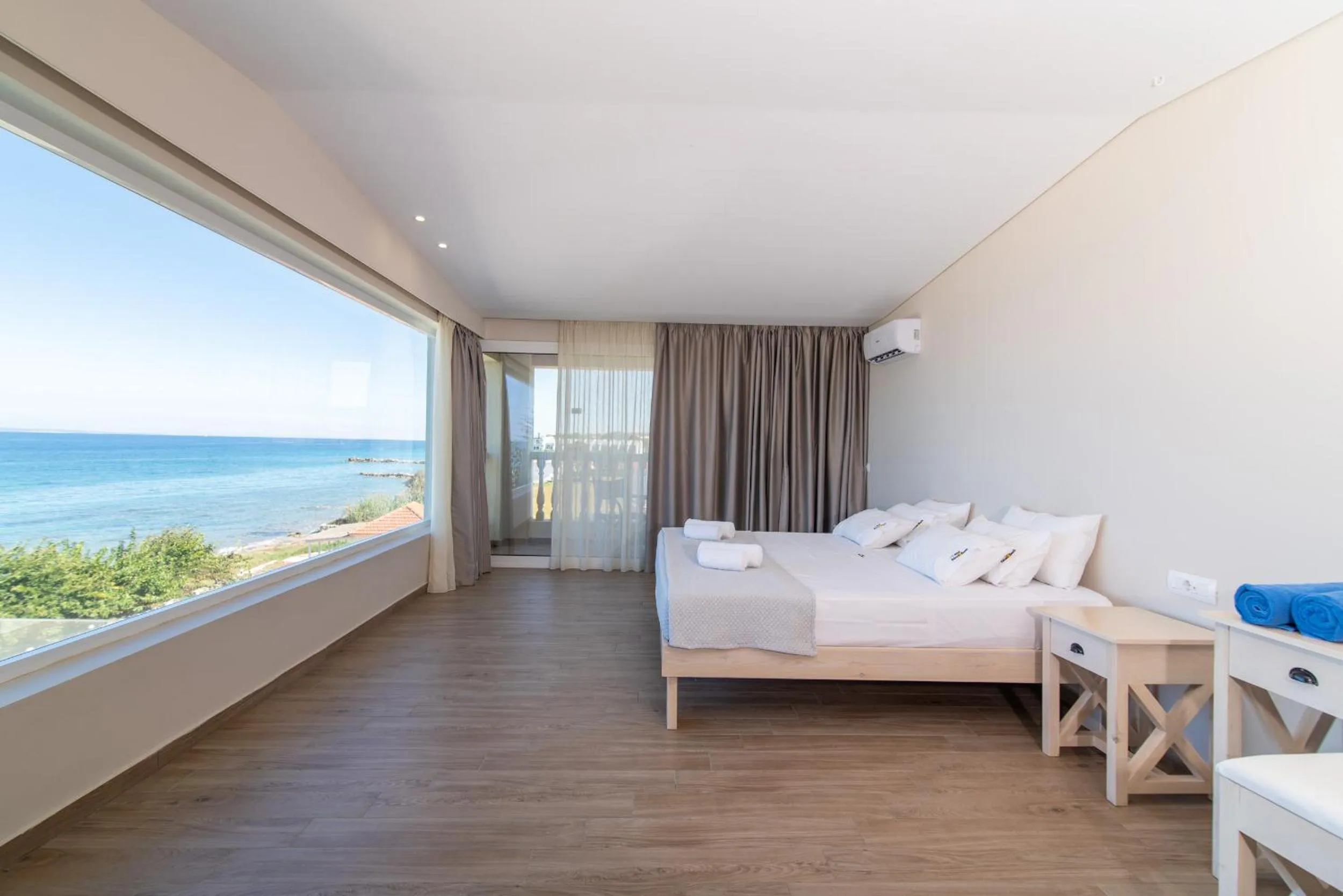 Bedroom in Belussi Beach Hotel & Suites