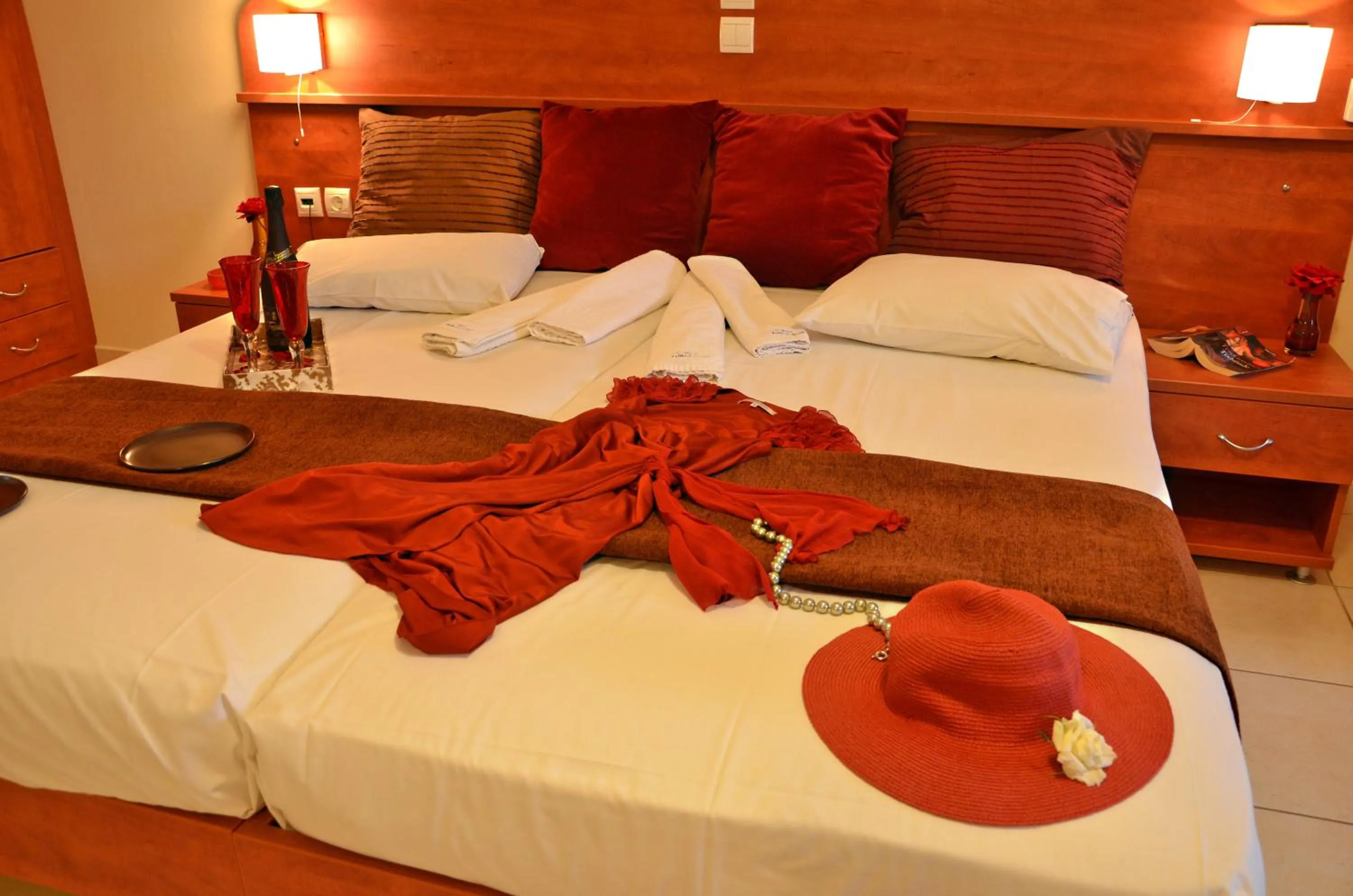 Bed in Belussi Beach Hotel & Suites