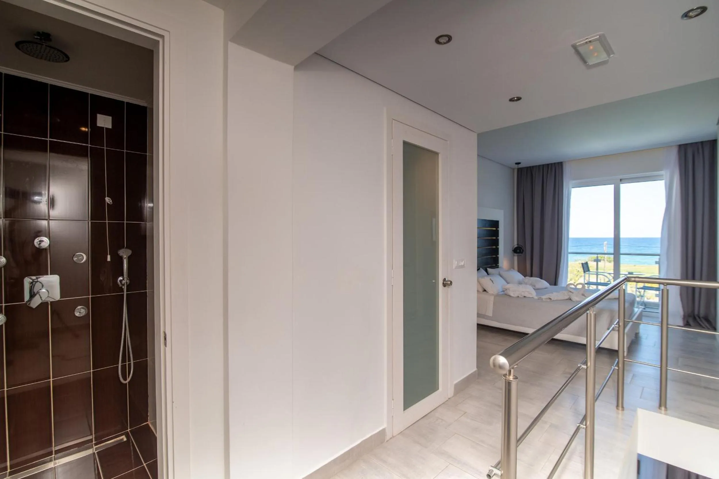 Bathroom in Belussi Beach Hotel & Suites