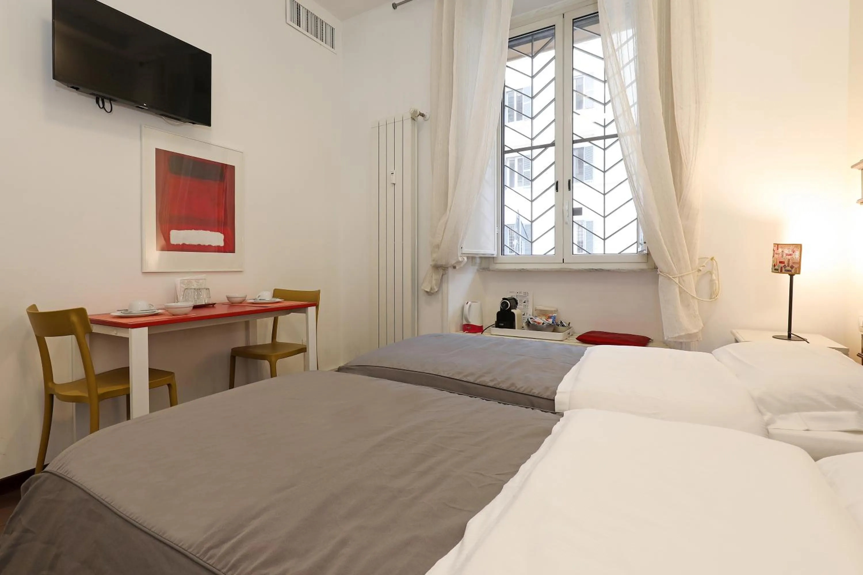 Bed in Maison Colosseo (Via dei Querceti 24)