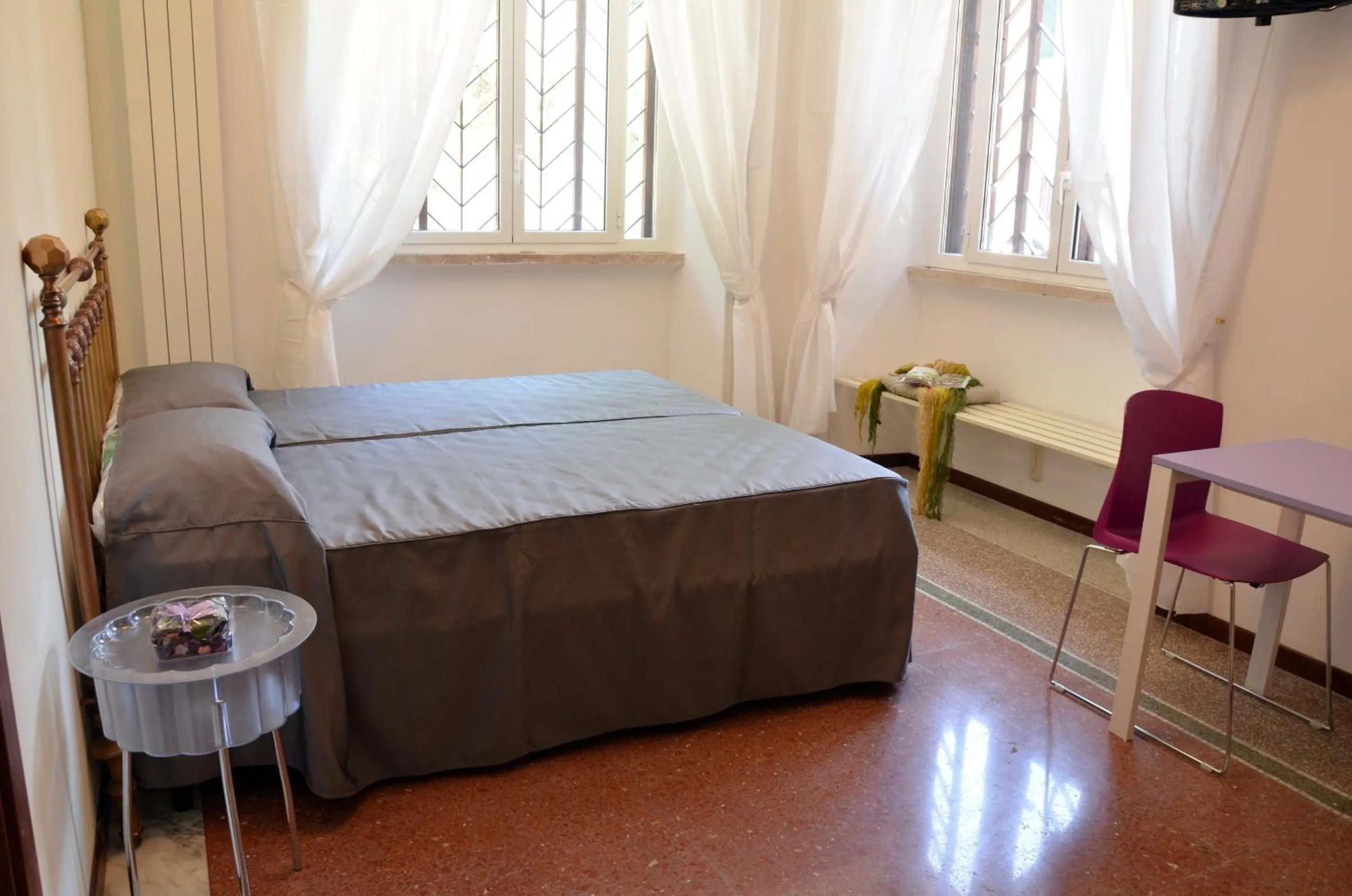 Bed in Maison Colosseo (Via dei Querceti 24)
