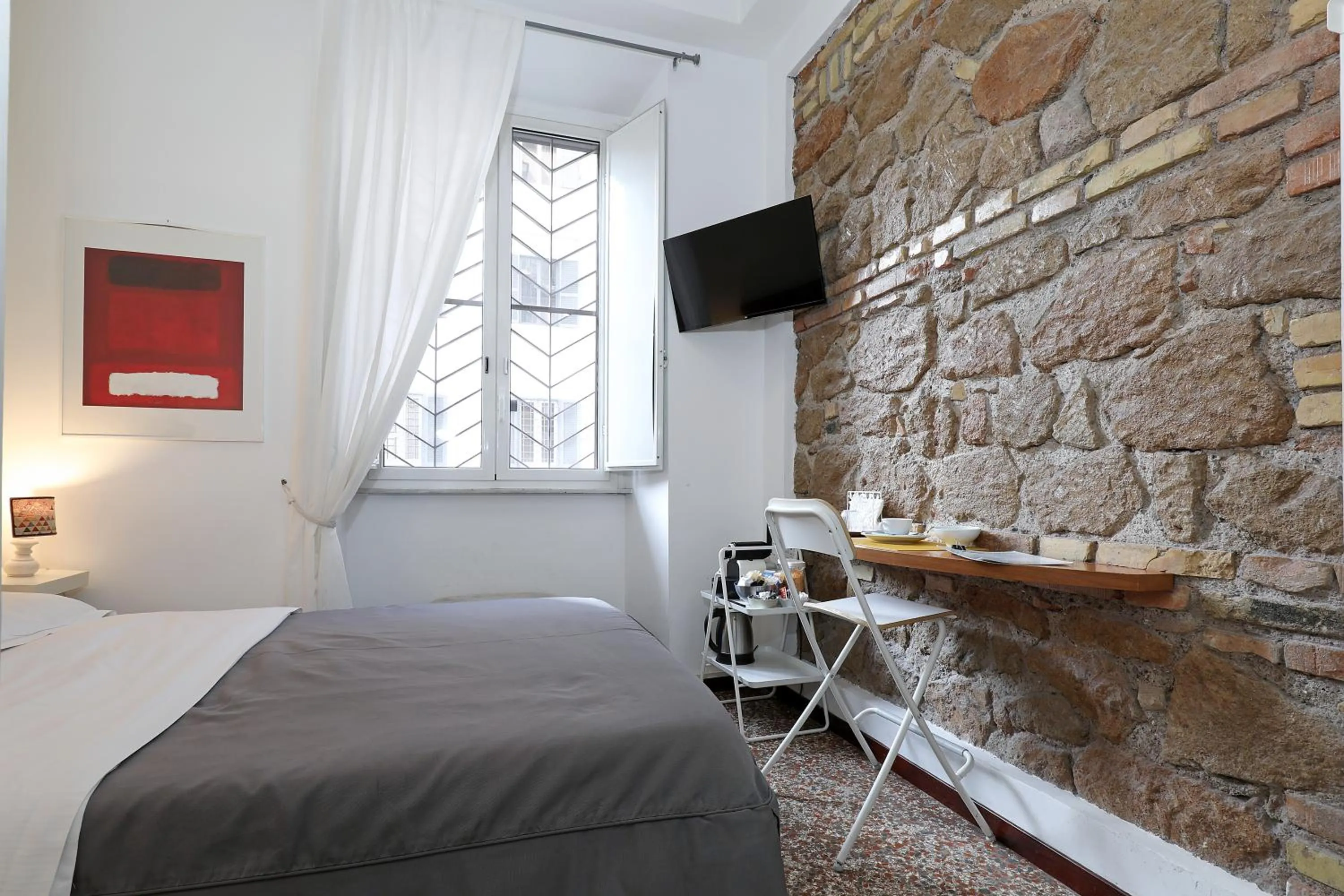 Bed in Maison Colosseo (Via dei Querceti 24)