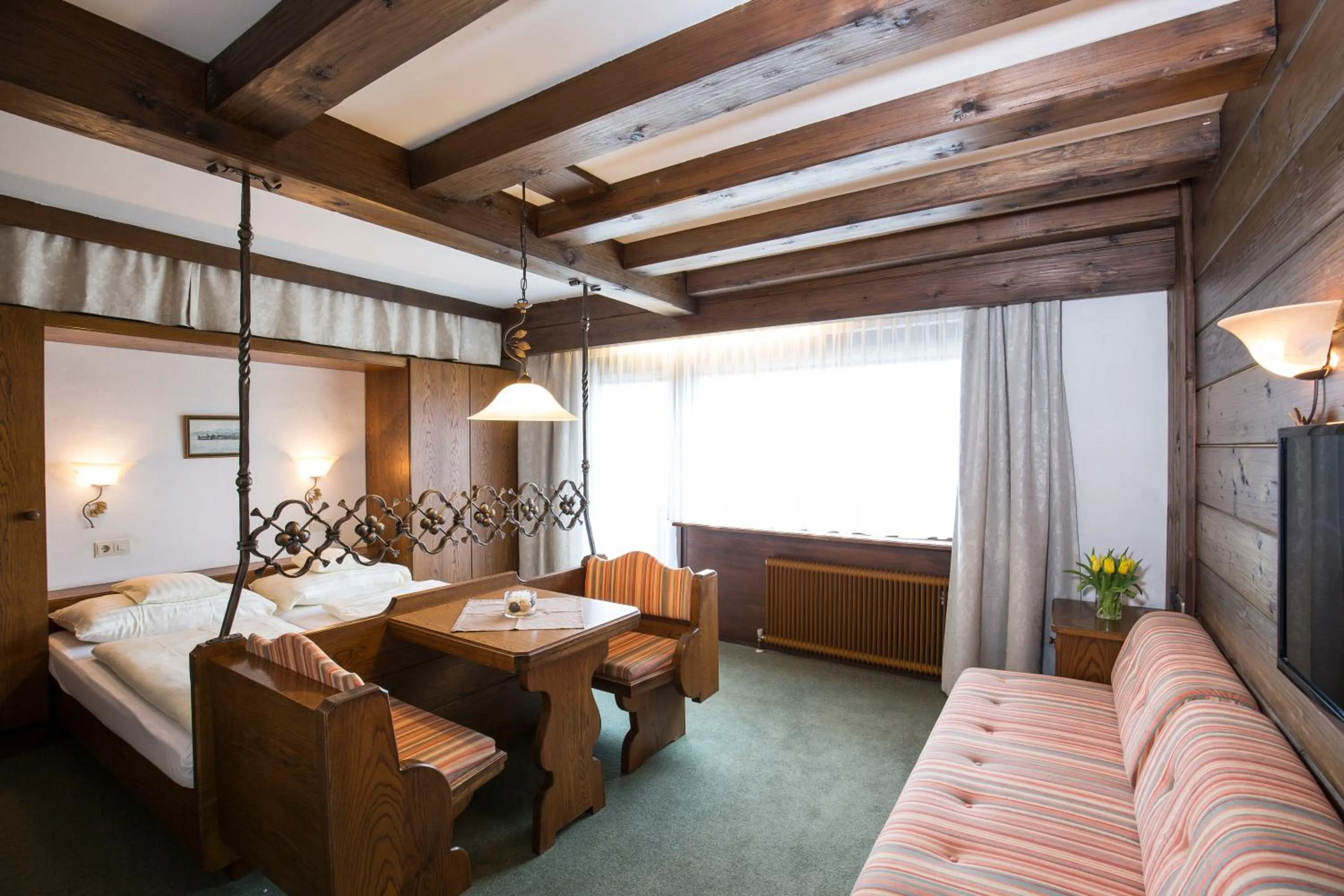 Seating area, Bed in Hotel Altmünsterhof