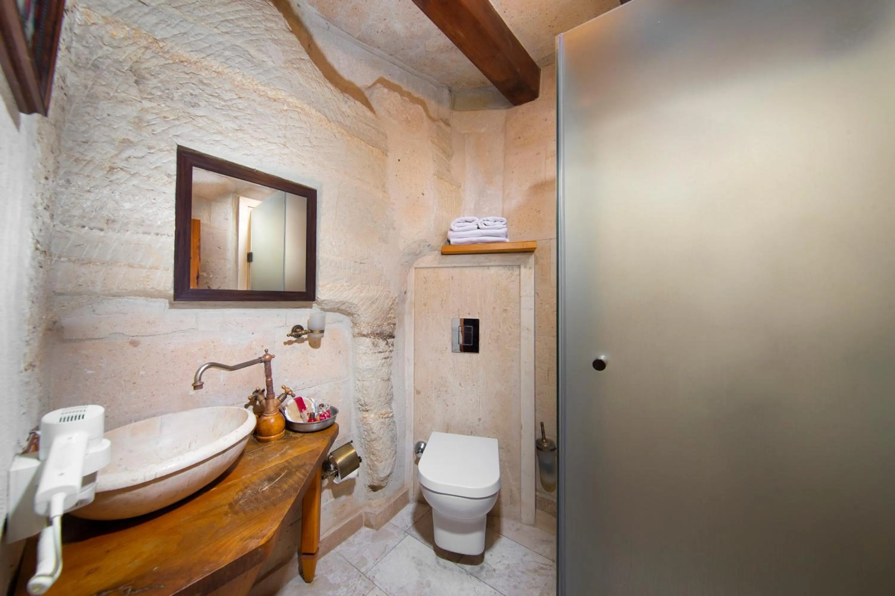 Shower in Terra Cave Hotel