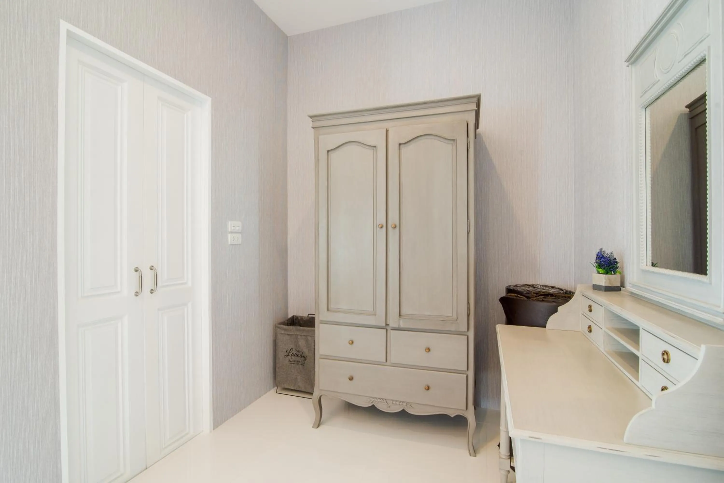 Decorative detail, TV/Entertainment Center in Wan Arun Houses