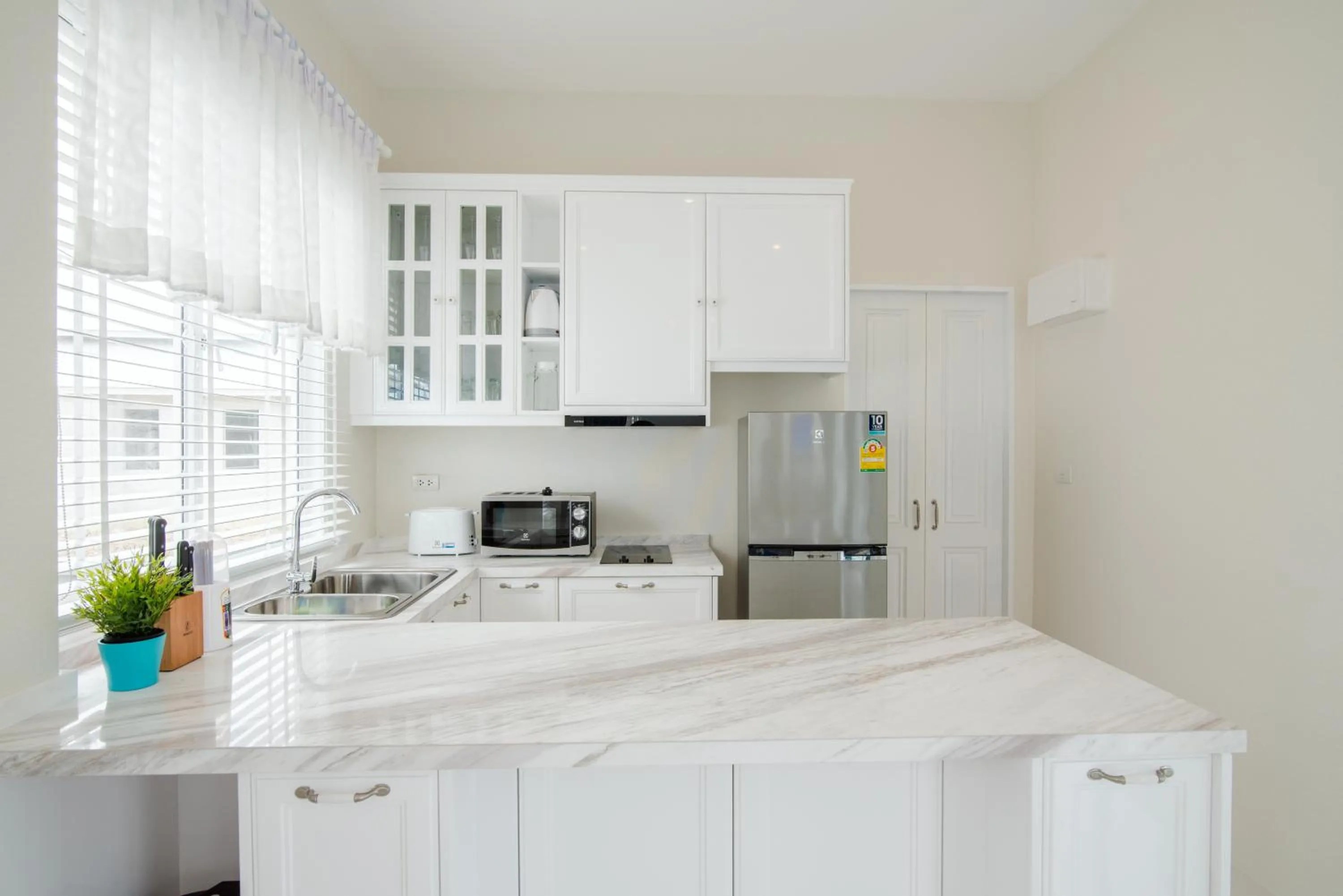 Communal kitchen, Kitchen/Kitchenette in Wan Arun Houses