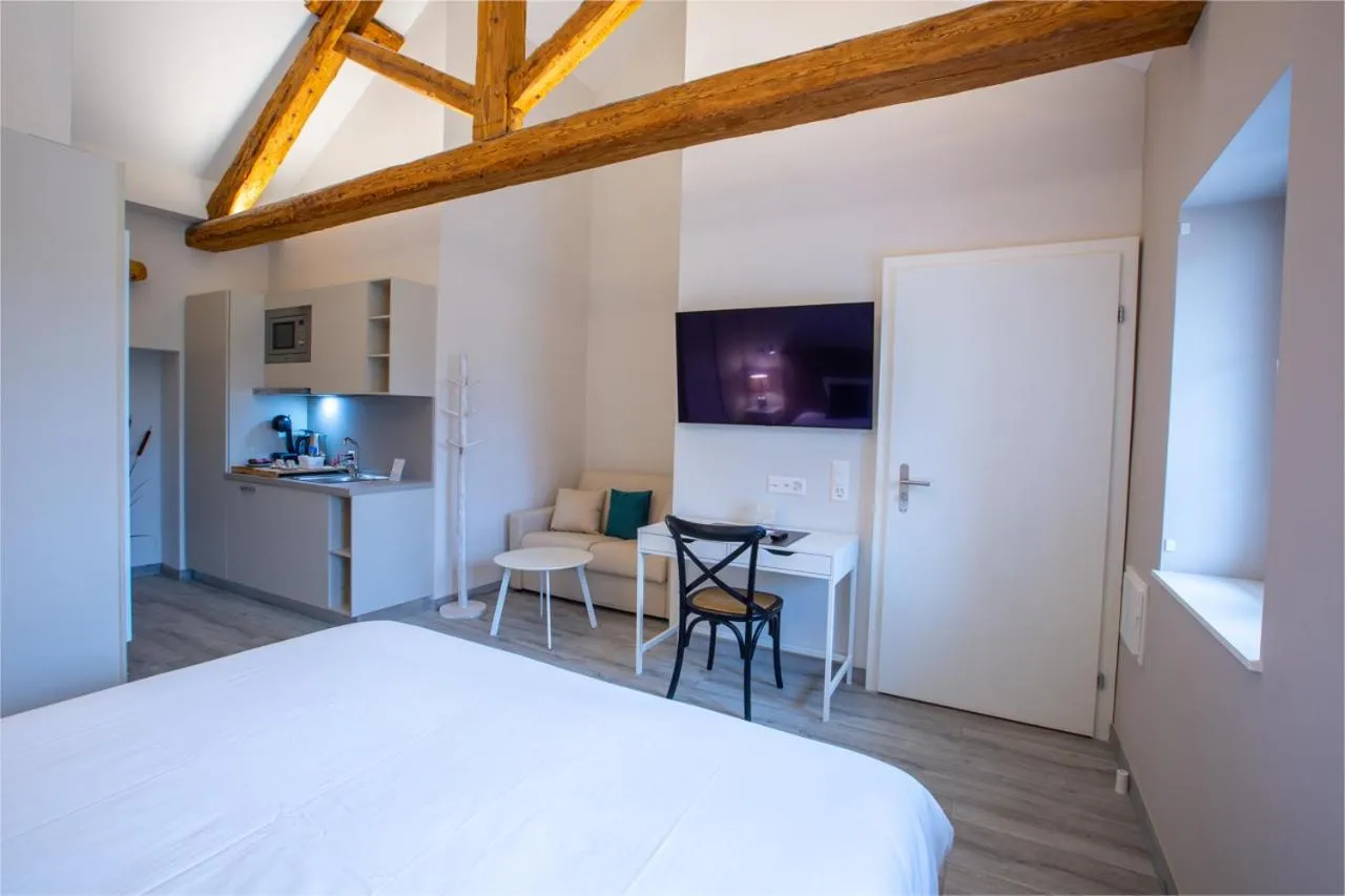 Bed in Auberge des Grands Bois