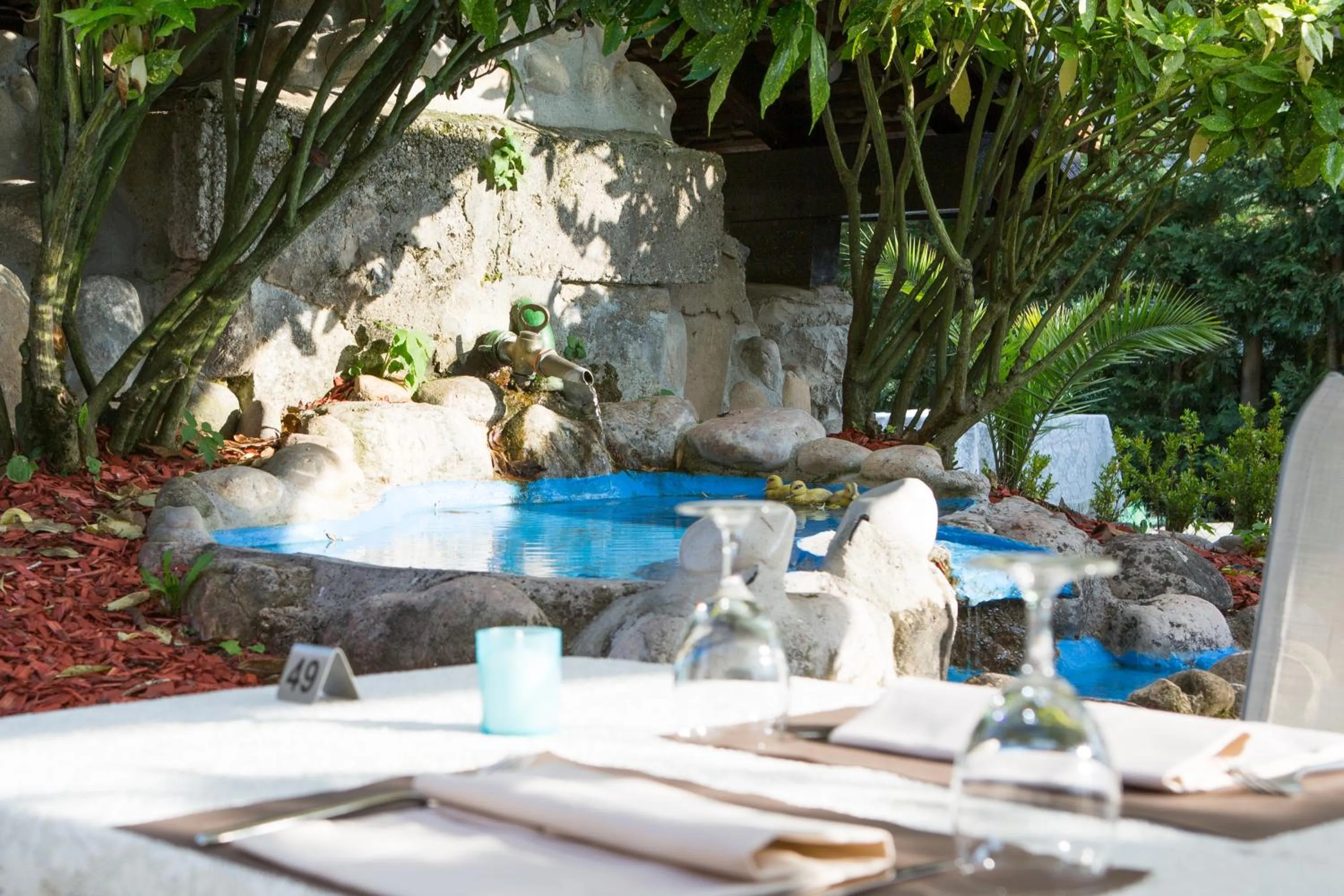 Garden view in Auberge des Grands Bois