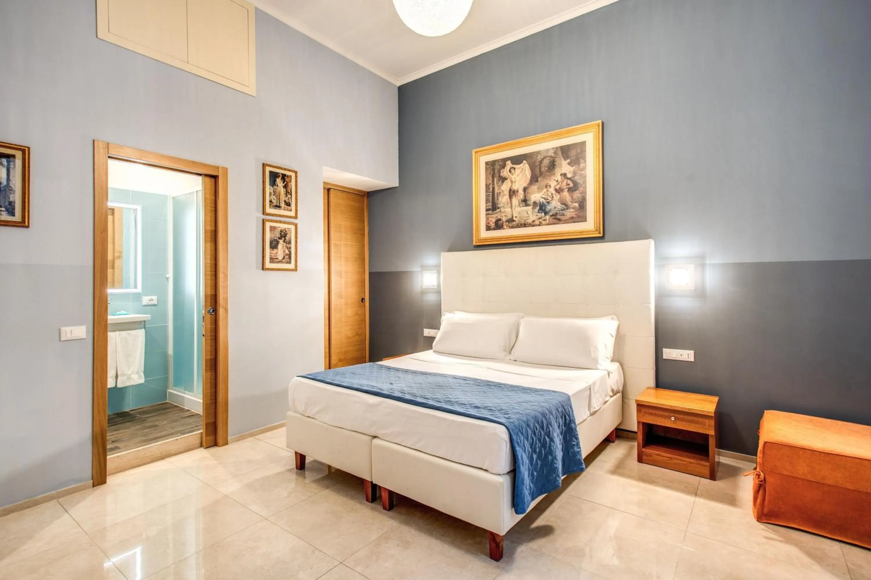 Bed in La Residenza Suites