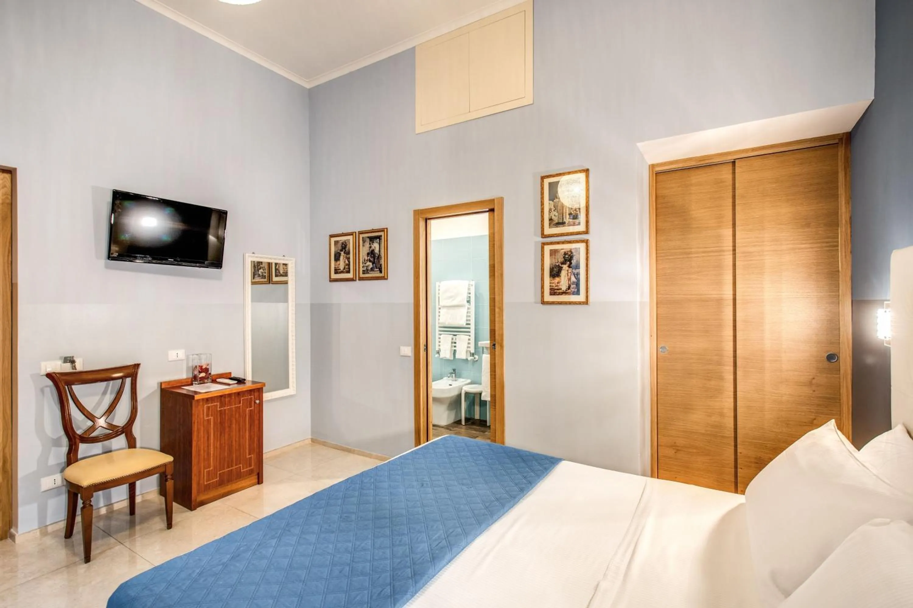 Bed in La Residenza Suites