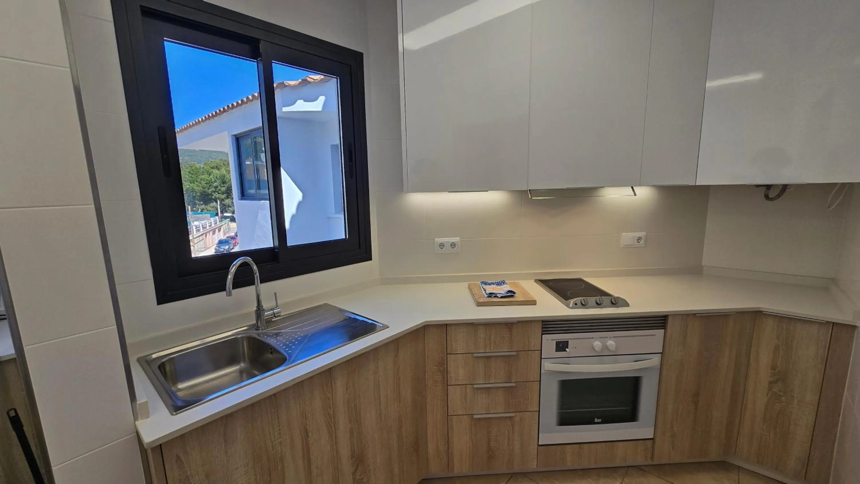 Kitchen or kitchenette in Marina Palmanova Apartamentos