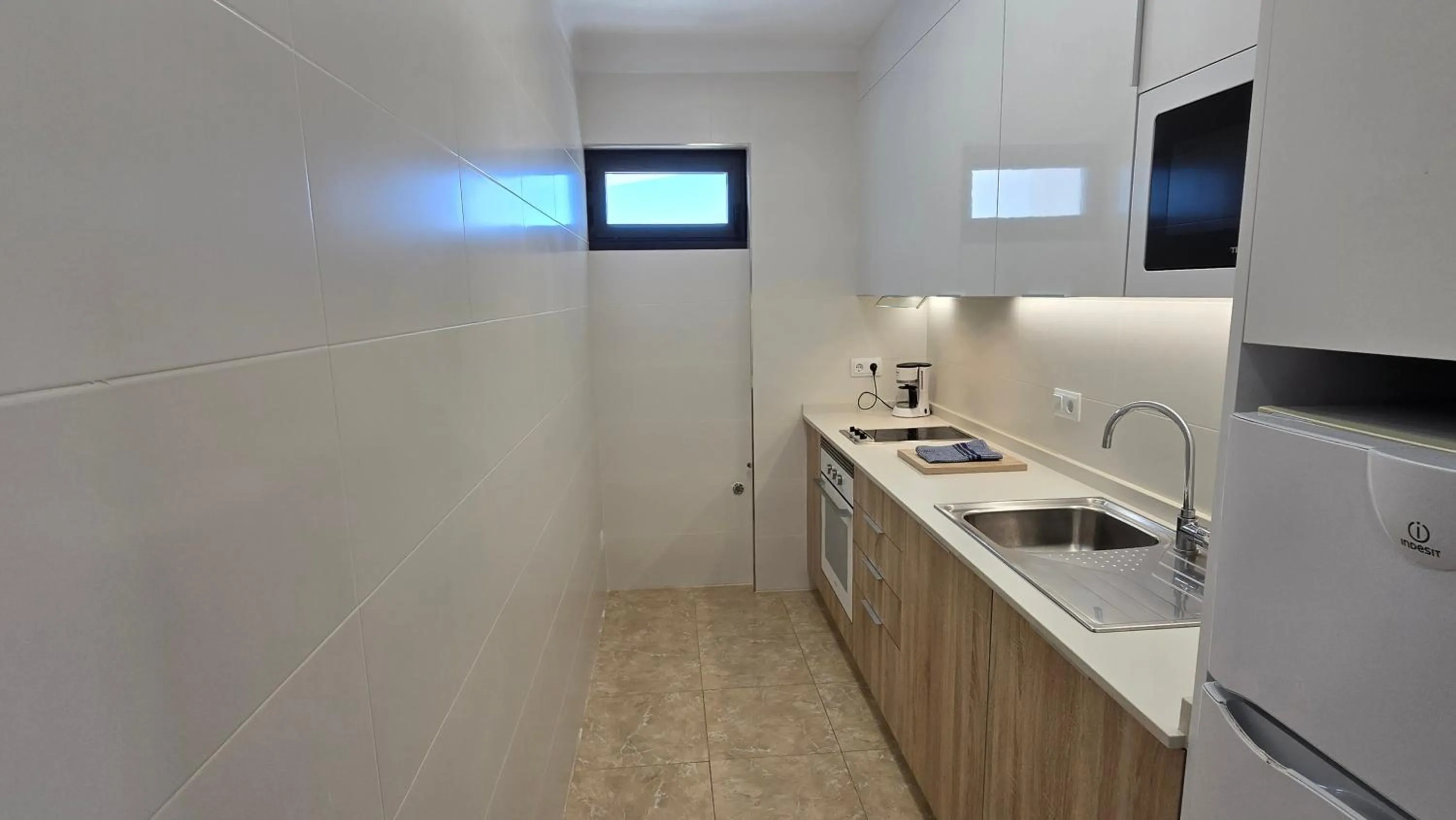 Kitchen or kitchenette in Marina Palmanova Apartamentos