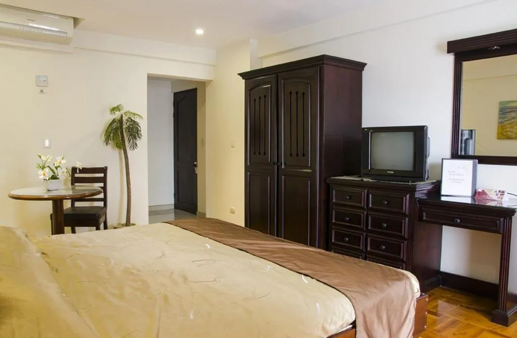 Bed in Hotel Plaza Real Suites & Apartments San Jose