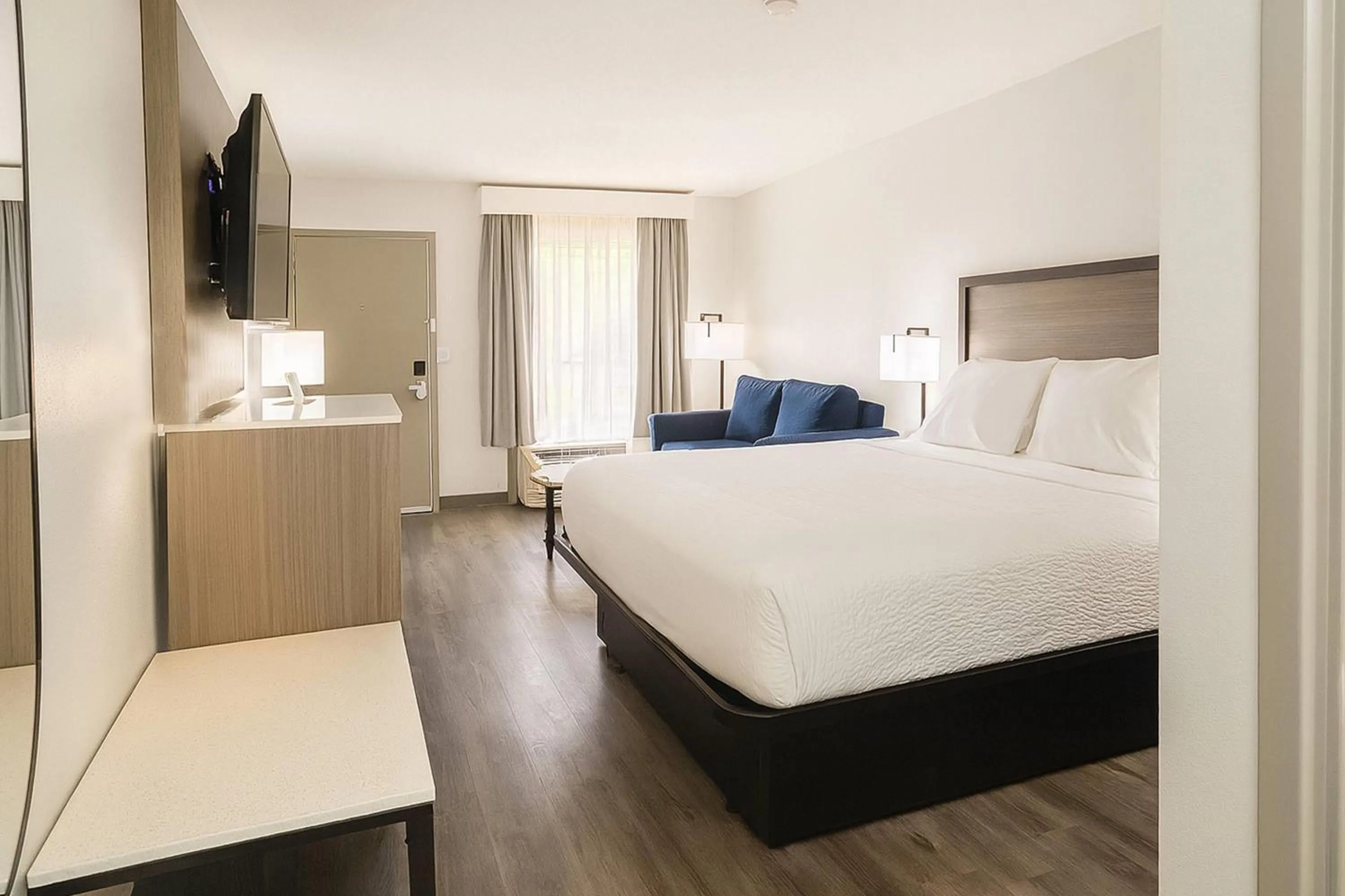 Photo of the whole room, Bed in Baymont by Wyndham Fayetteville