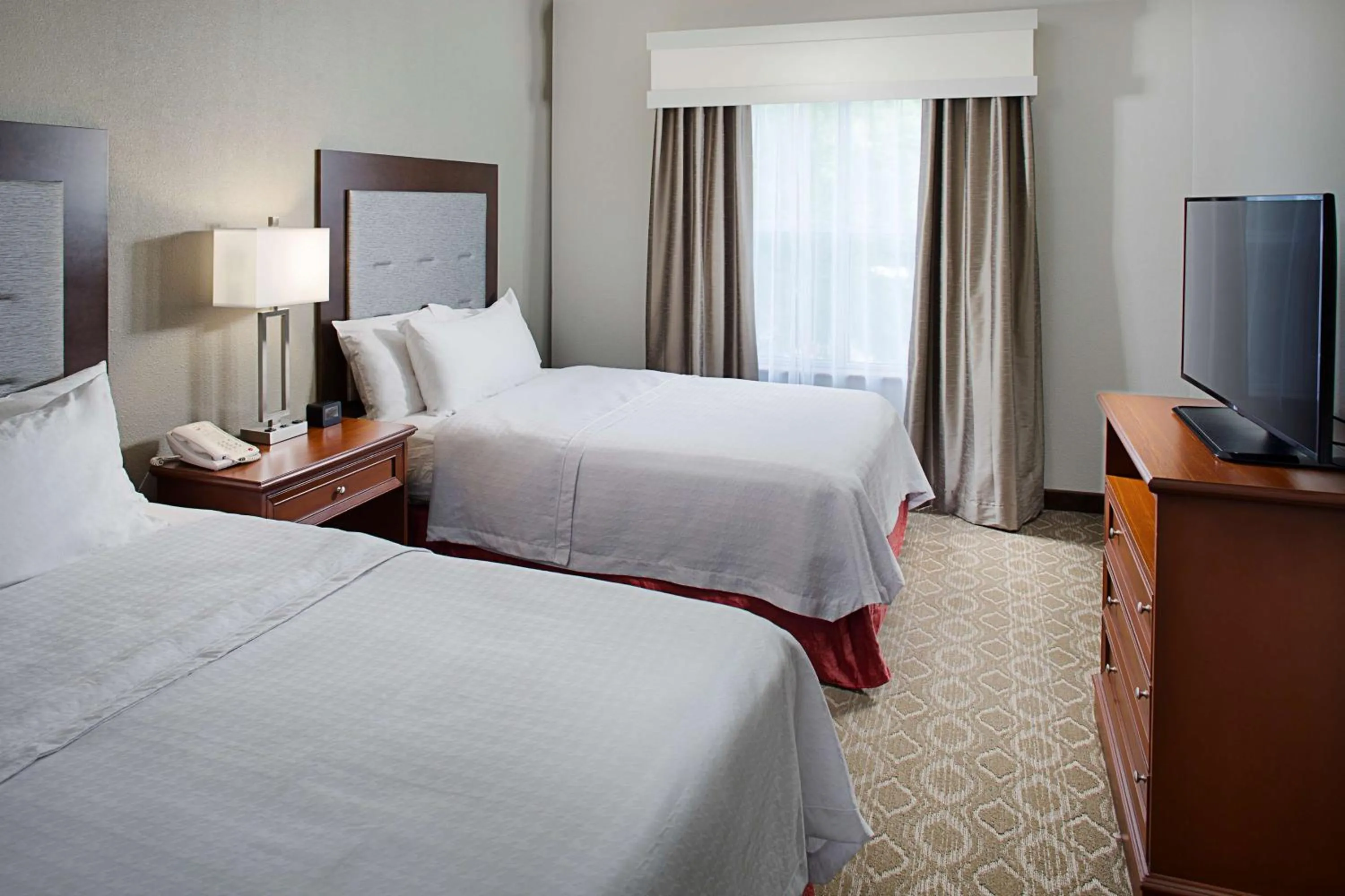 Bed in Homewood Suites by Hilton Raleigh/Cary