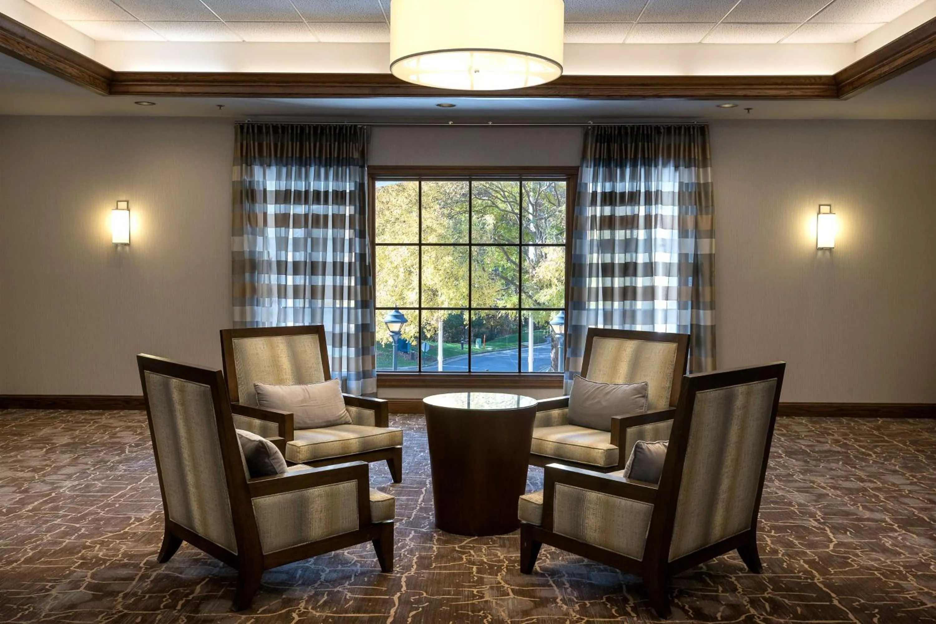 Communal lounge/ TV room in Homewood Suites by Hilton Raleigh/Cary