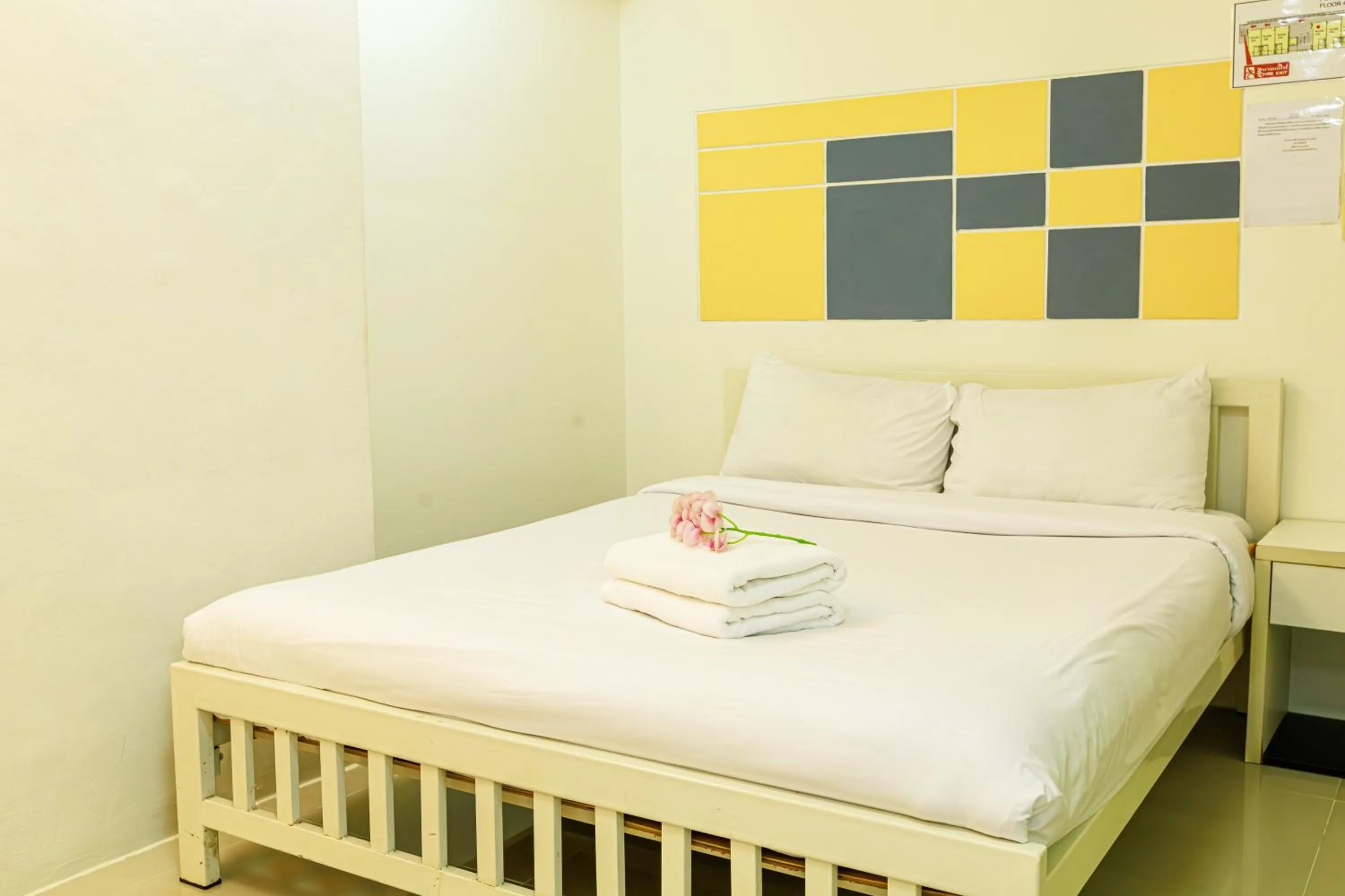 Bed in PDA Lord Hotel