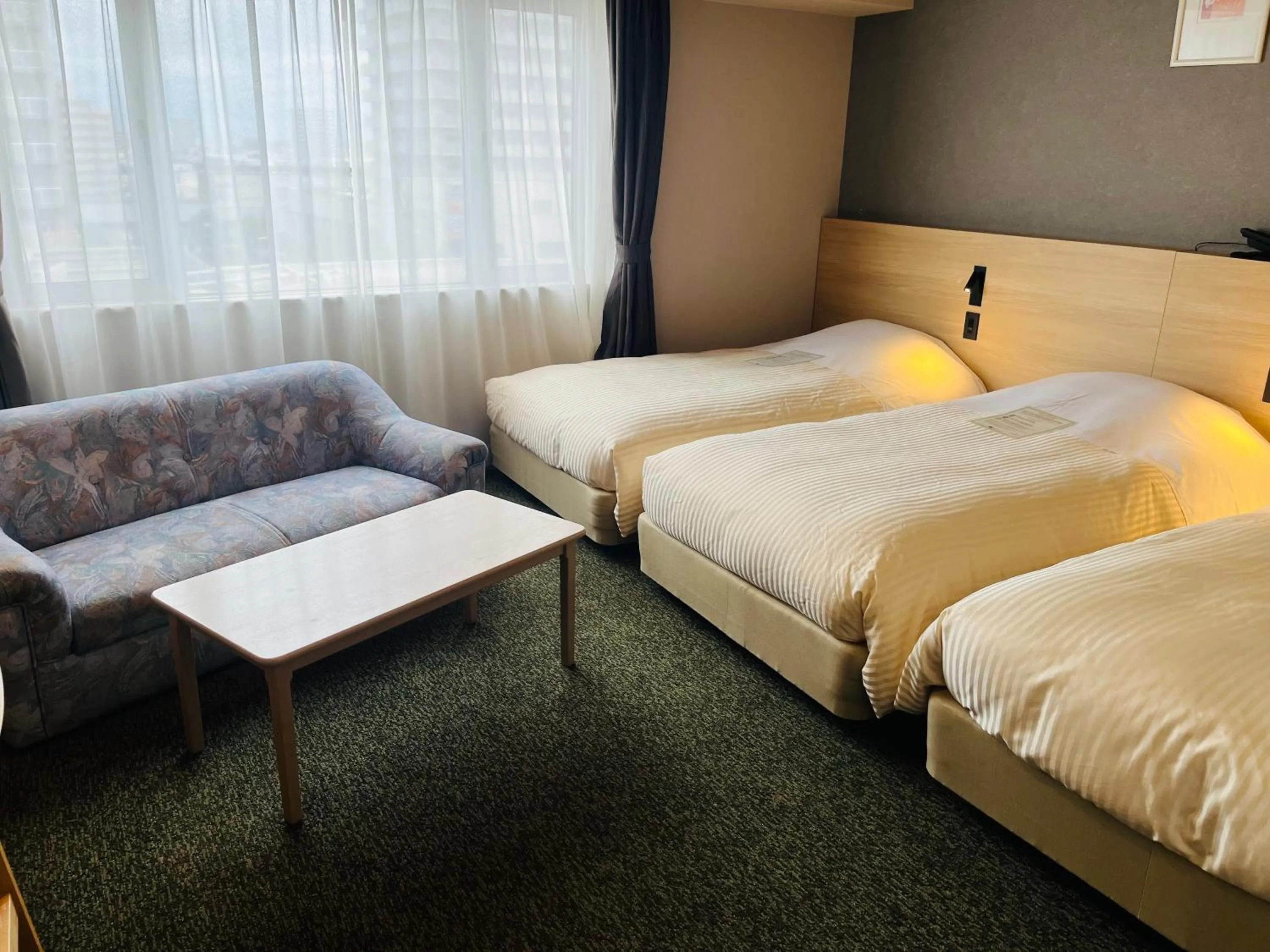 Bedroom, Bed in Kotoni Green Hotel