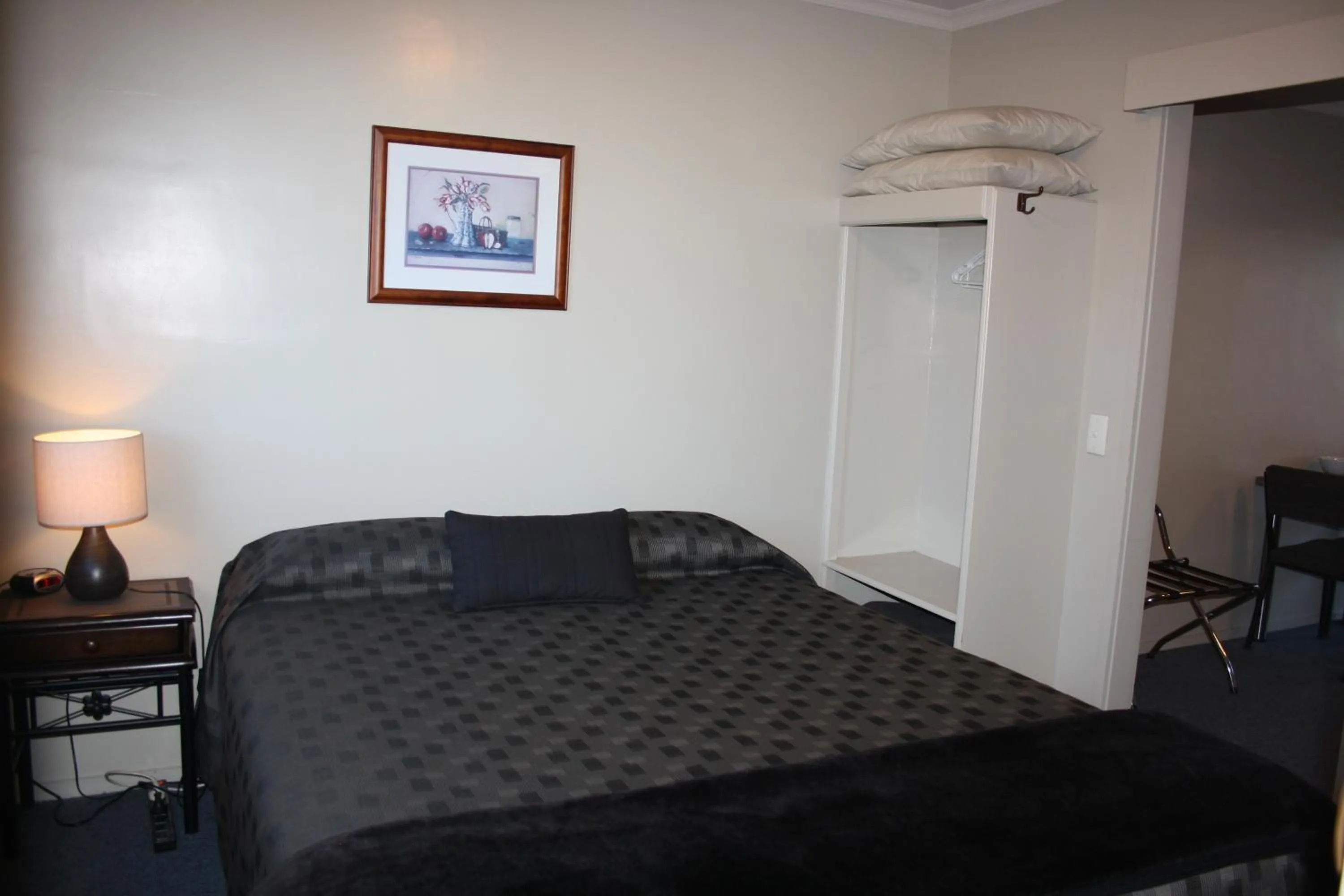 Bed in Ashbury Park Motel