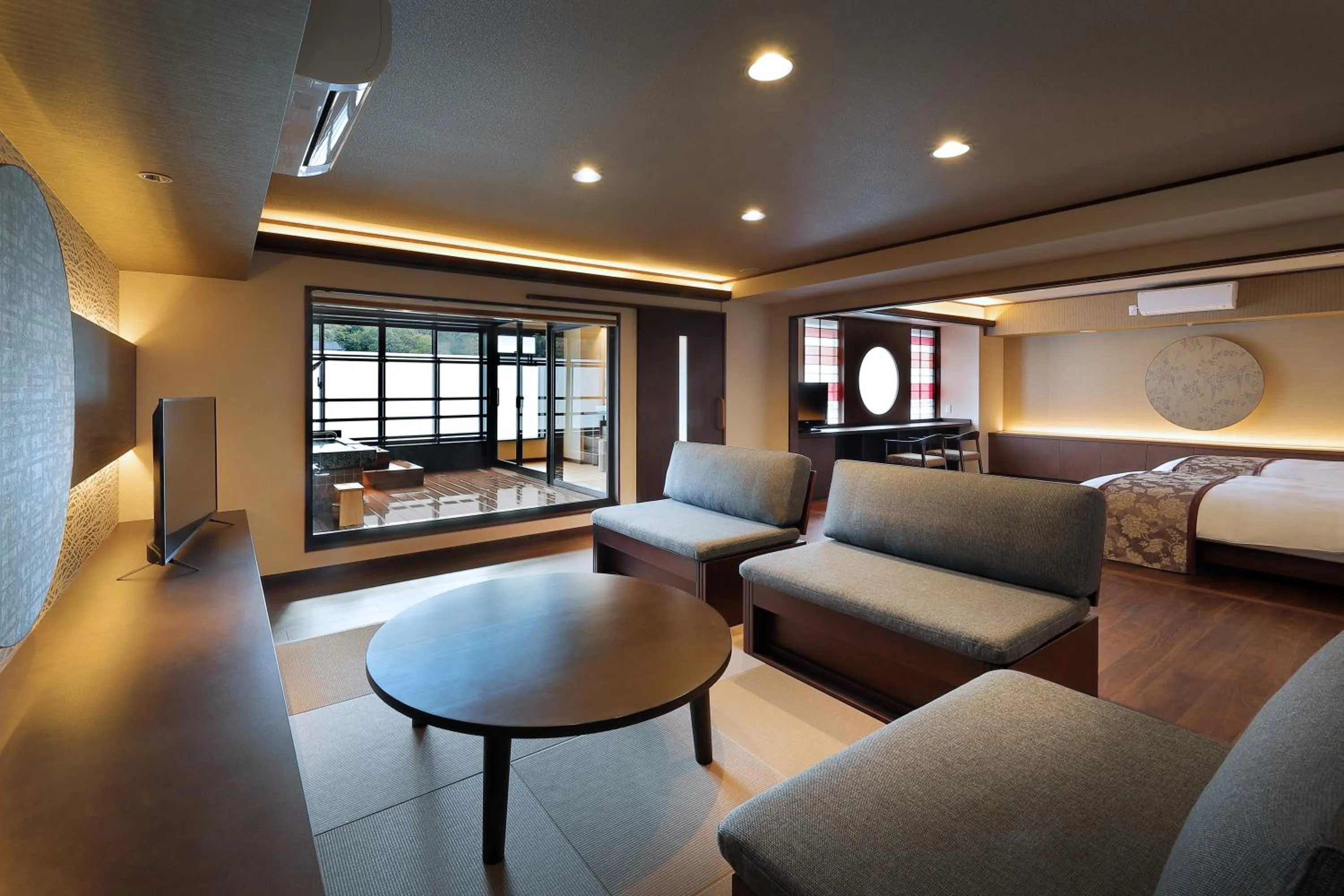 Living room, Bed in Marukyu Ryokan