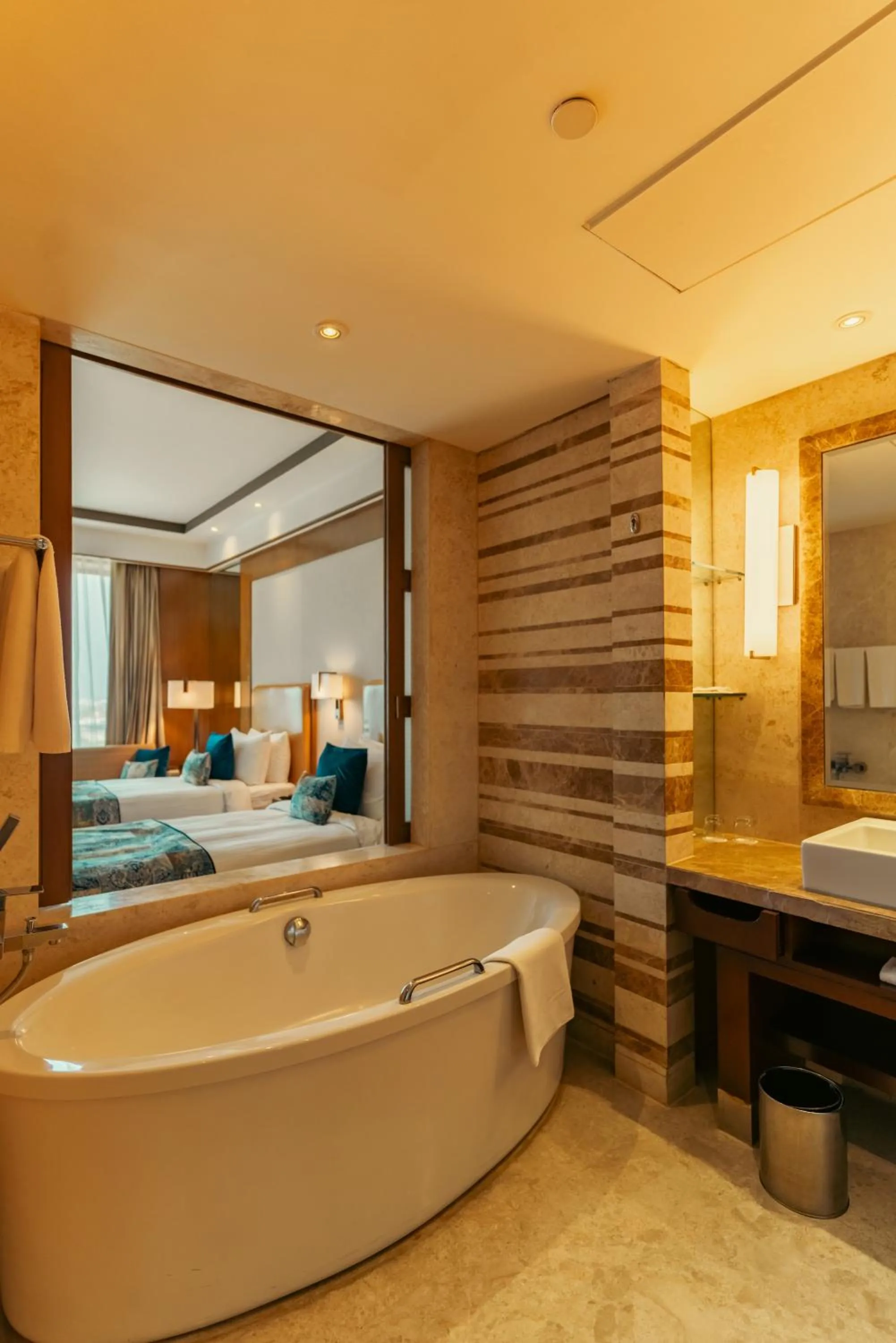 Bathroom, Bed in Crowne Plaza New Delhi Okhla by IHG