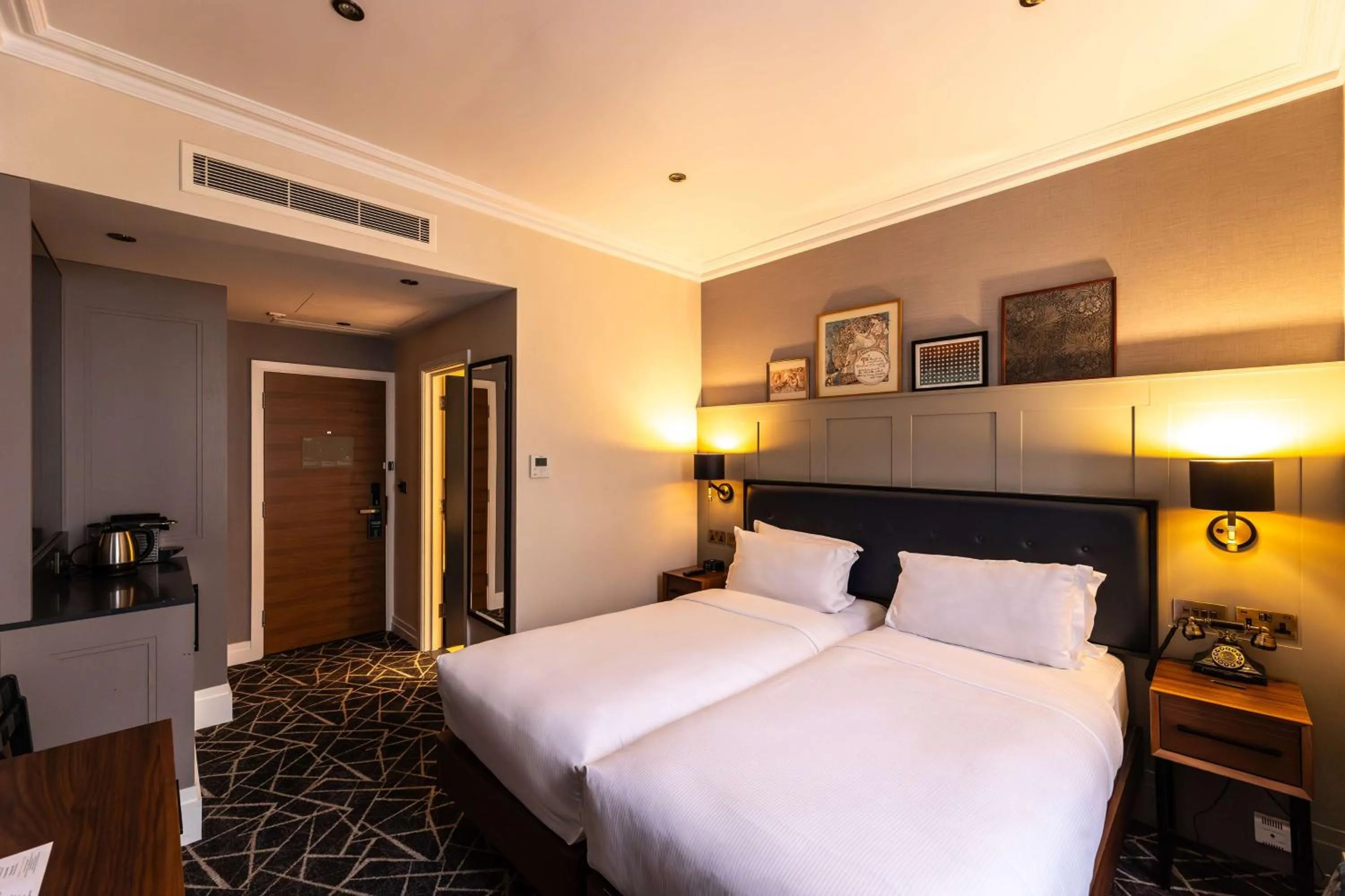 Bed in 100 Queen's Gate Hotel London Kensington, Curio Collection by Hilton