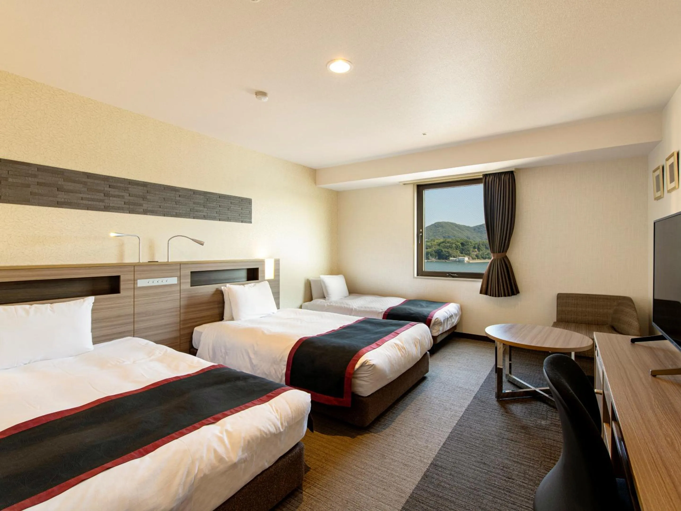 Photo of the whole room, Bed in Onomichi Kokusai Hotel
