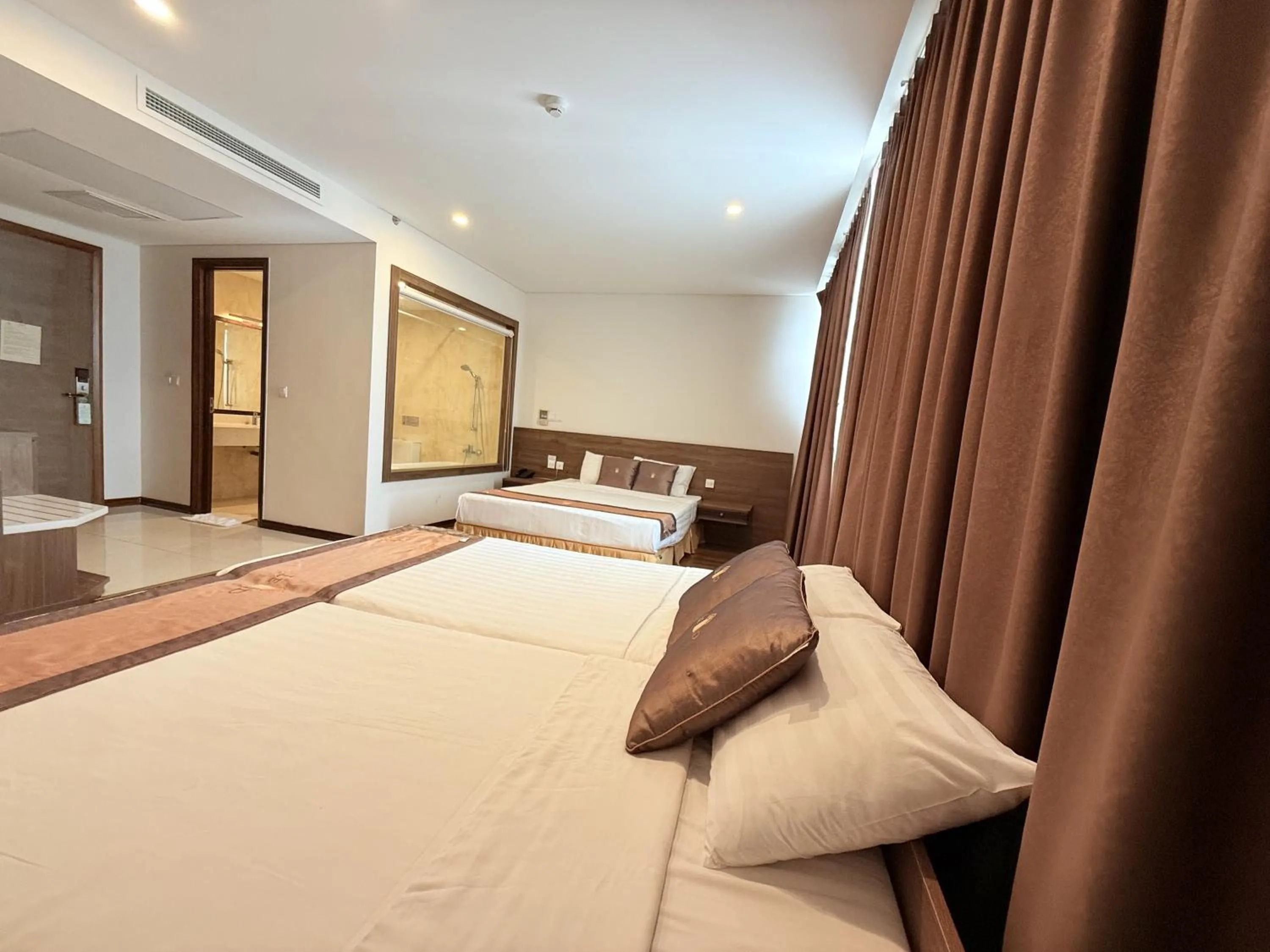 Bed in Lenid Ocean View Hotel