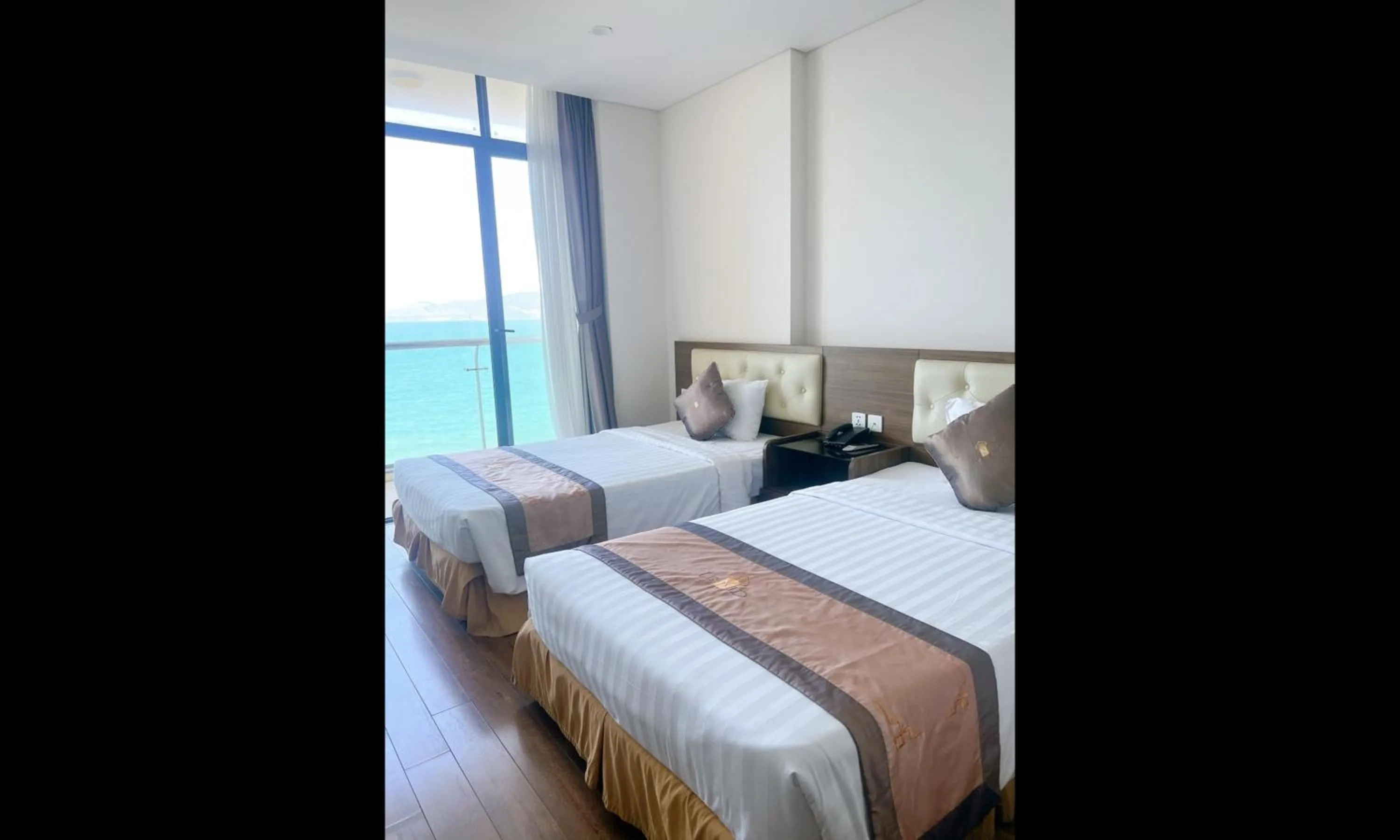 Bed in Lenid Ocean View Hotel