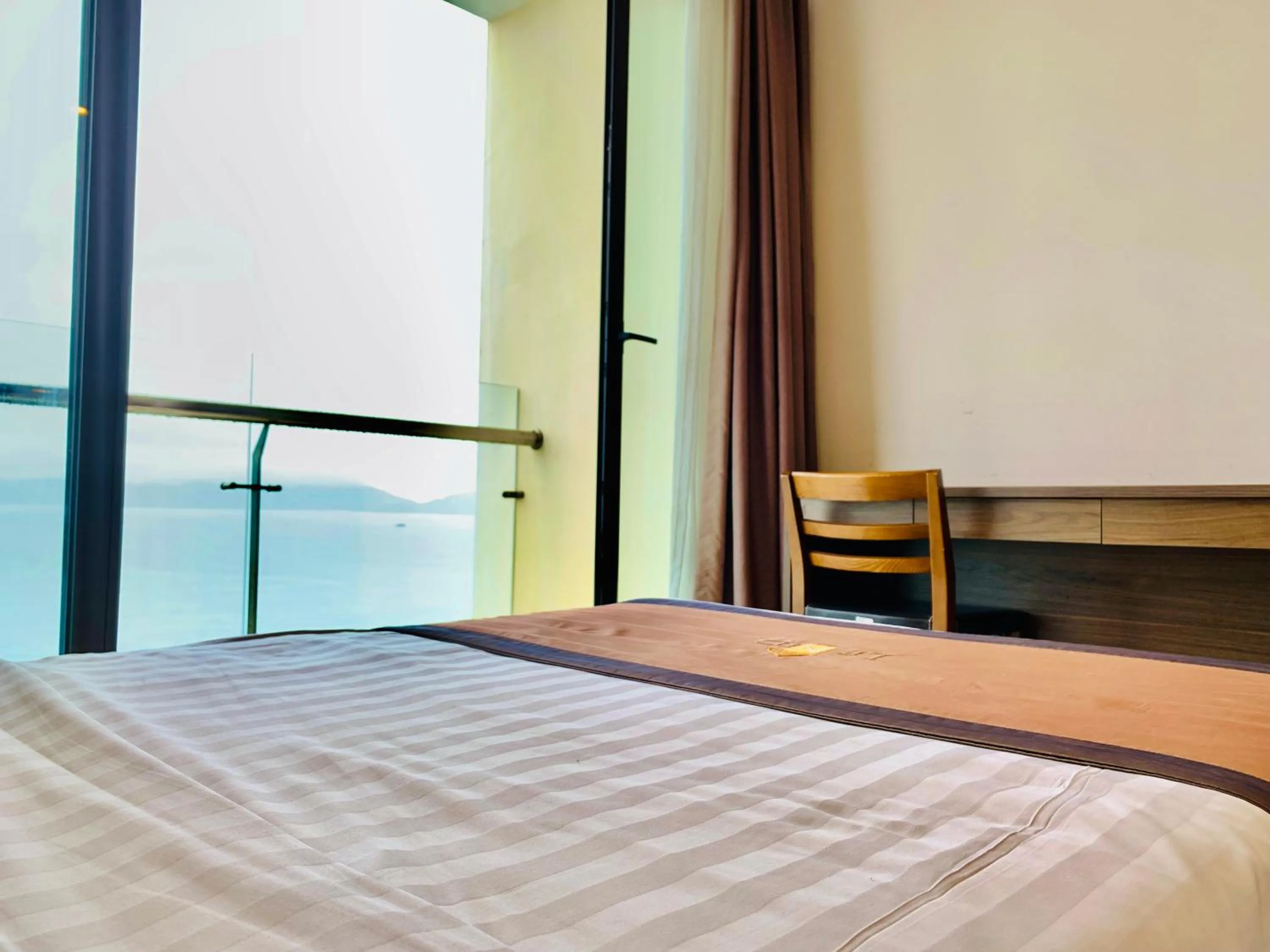 Bed in Lenid Ocean View Hotel