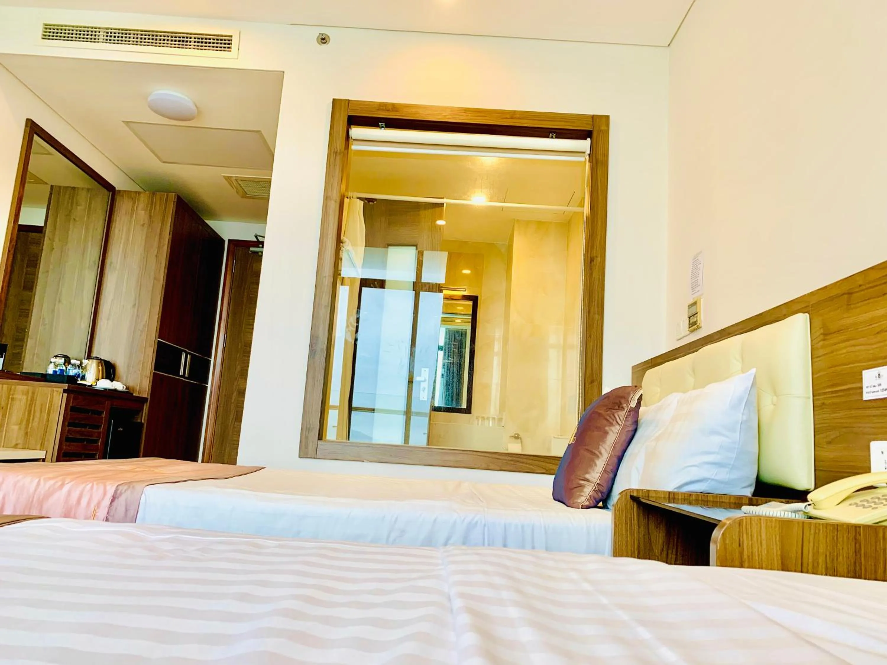 Bed in Lenid Ocean View Hotel