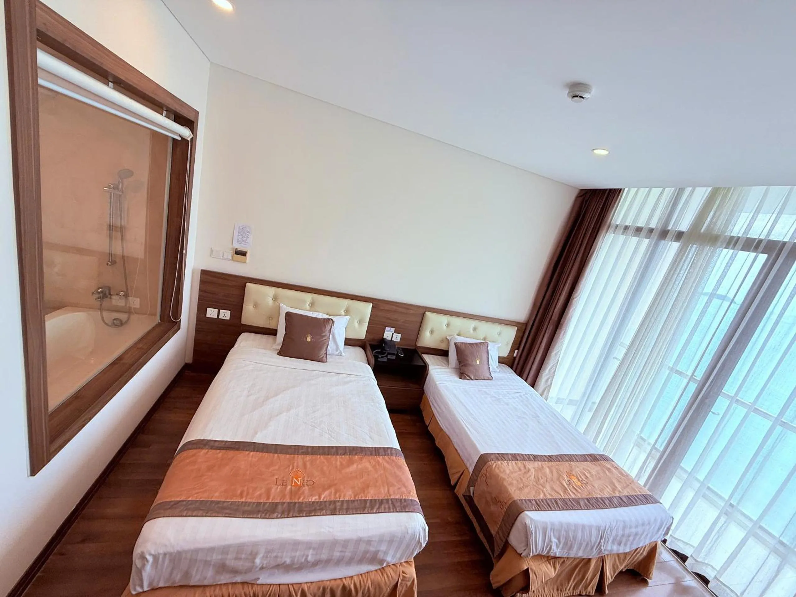 Bed in Lenid Ocean View Hotel