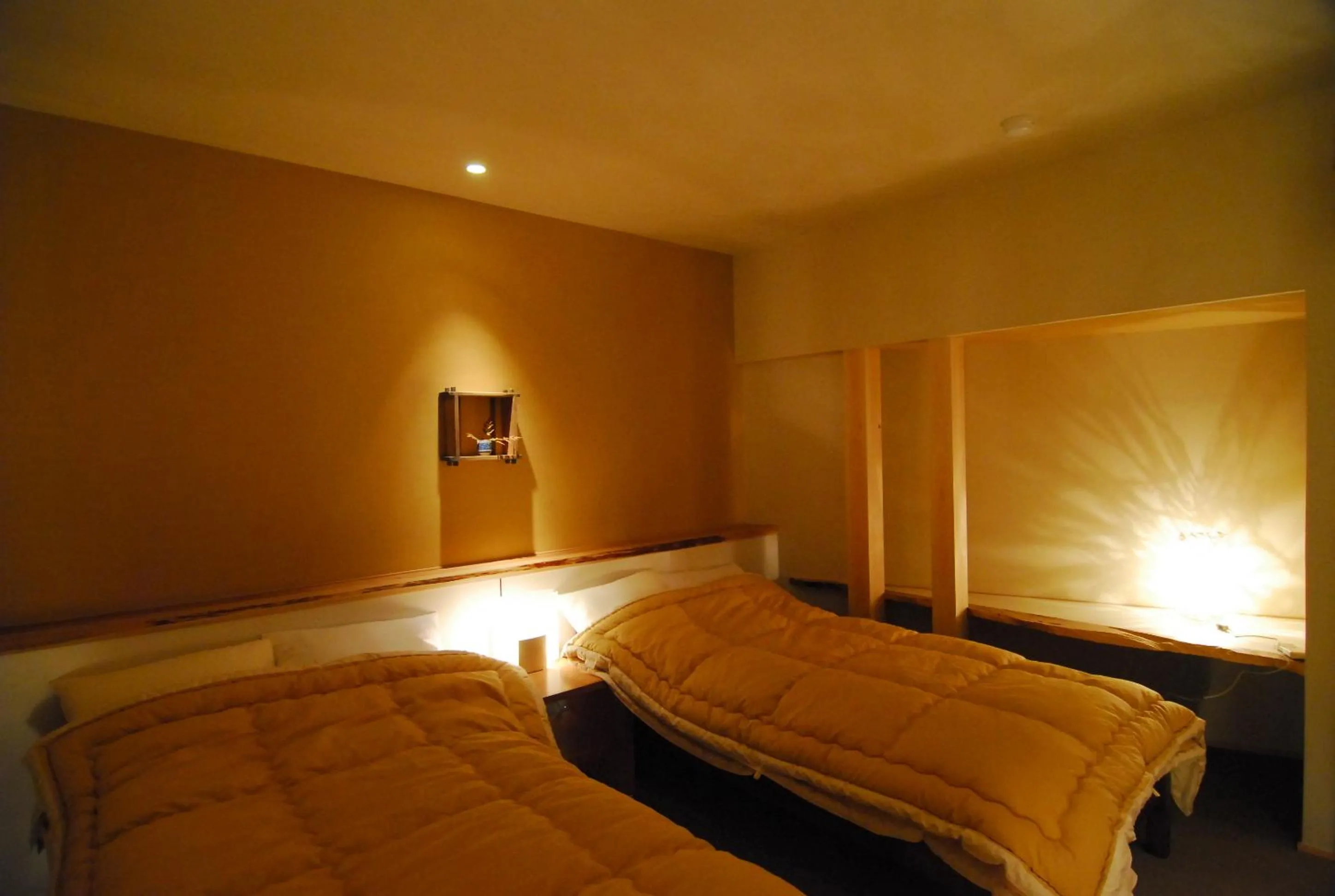 Photo of the whole room, Bed in AKARI et KAORI formerly Taizanso