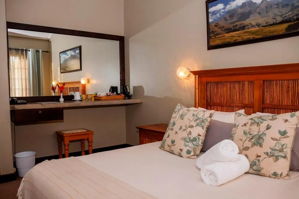 Bedroom, Bed in The Nest Drakensberg Mountain Resort Hotel