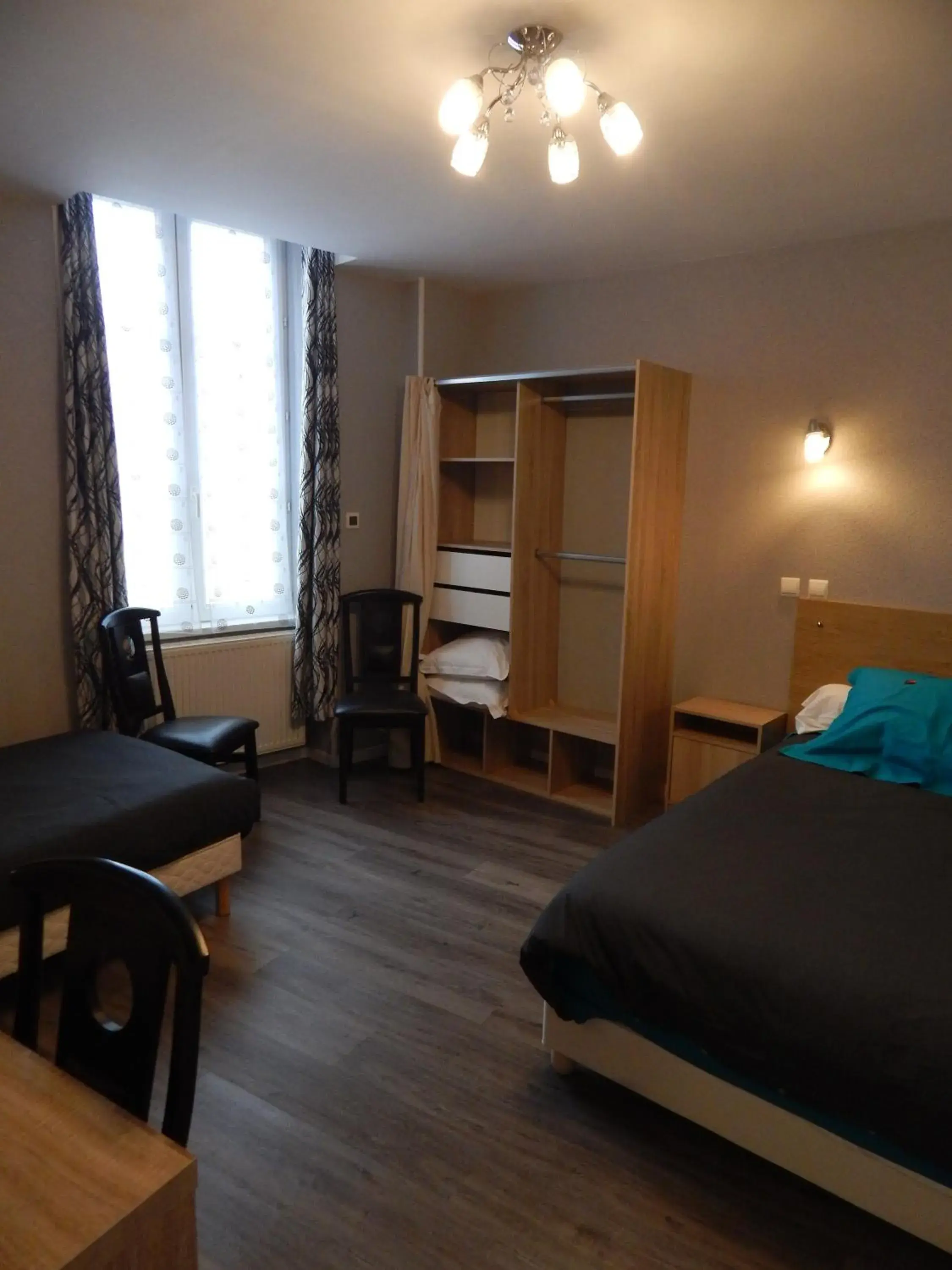 Superior Triple Room in Le Lion D'or Superior Triple Room in Le Lion D'or