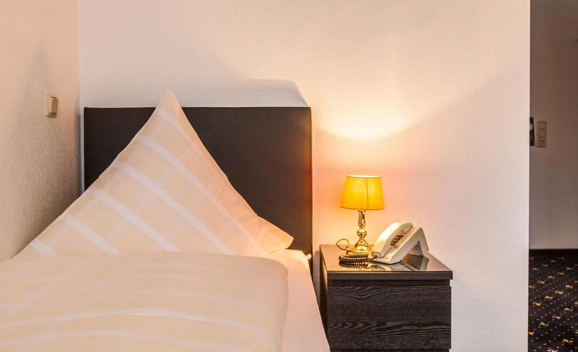 Bed in Hotel Quellental